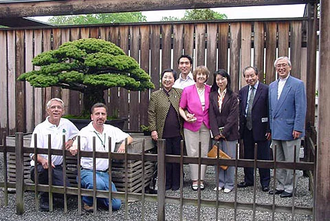 Photo left to right: curators Jim Hughes and Jack Sustic, Mrs. Takeko Yamaki Tatsuzaki, Mr. Jin Tatsuzaki, Mrs. Takehisa Iizuka, Ms. Amaki Tatsuzaki, Mr. Takehisa Iizuka, Mr. Takashi Tatsuzaki