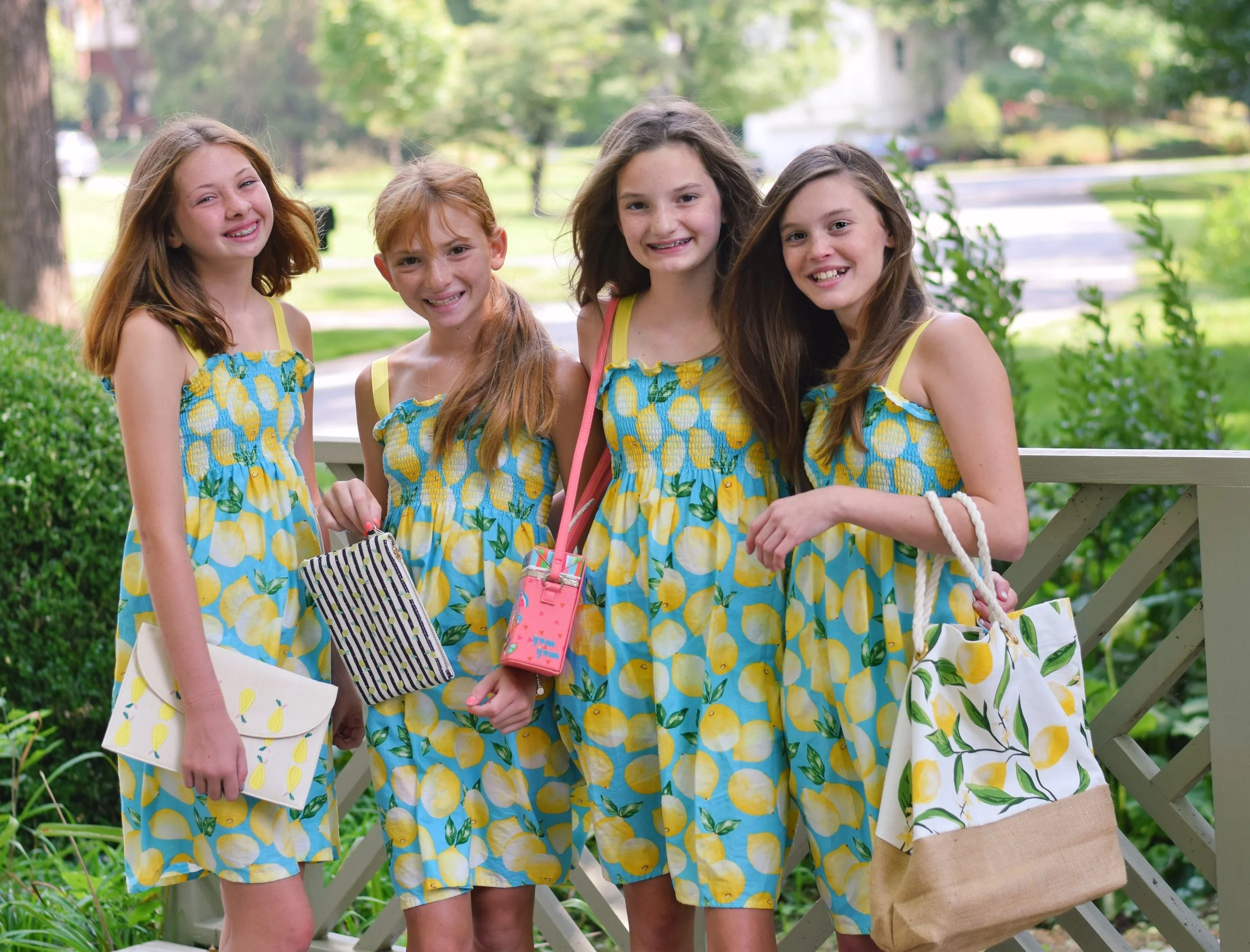four girls with dresses and purses.jpg
