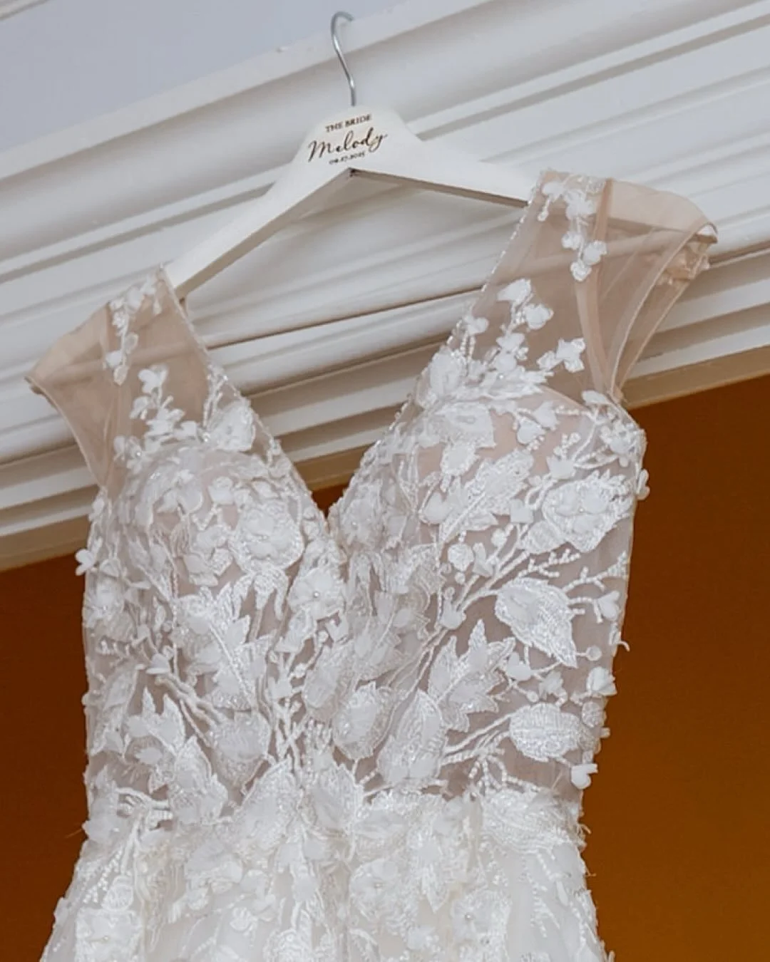 A moment for Melody&rsquo;s incredible dress and bridal details at home for her bride preparation. Her parents and sister were on board with love and support and a family commitment to securing the veil. Sometimes, it&rsquo;s the quiet moments that m