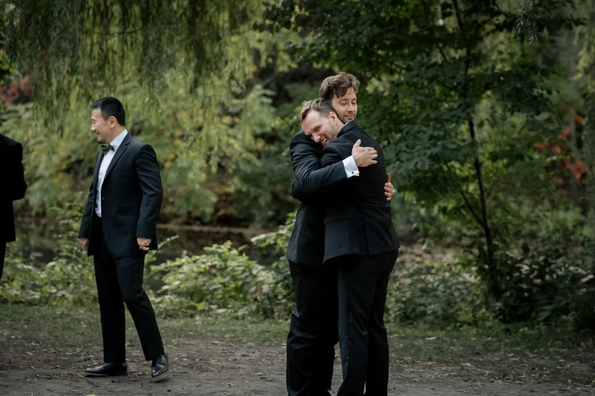 When it comes time for a few notable wedding day portraits of the groom and his best guys, anything goes. Be it a hug, a handshake, a silly hand sign, or simply a side by side shared smile for the camera, these frames should somehow feel like you and