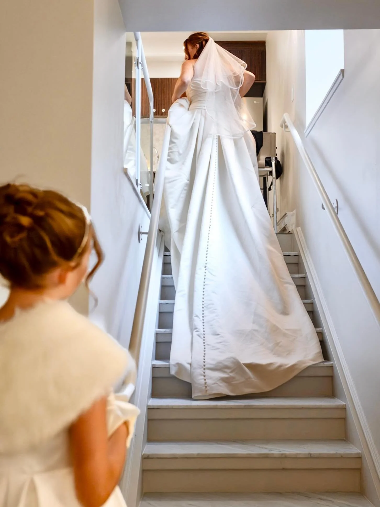 The bride&rsquo;s first born watches her float up the stairs during her getting ready morning at @hotelbirksmontreal. I will forever wonder what she might be thinking in that moment of admiring her beautiful mum&hellip;♡

The Team: 
Day Of Planner: @