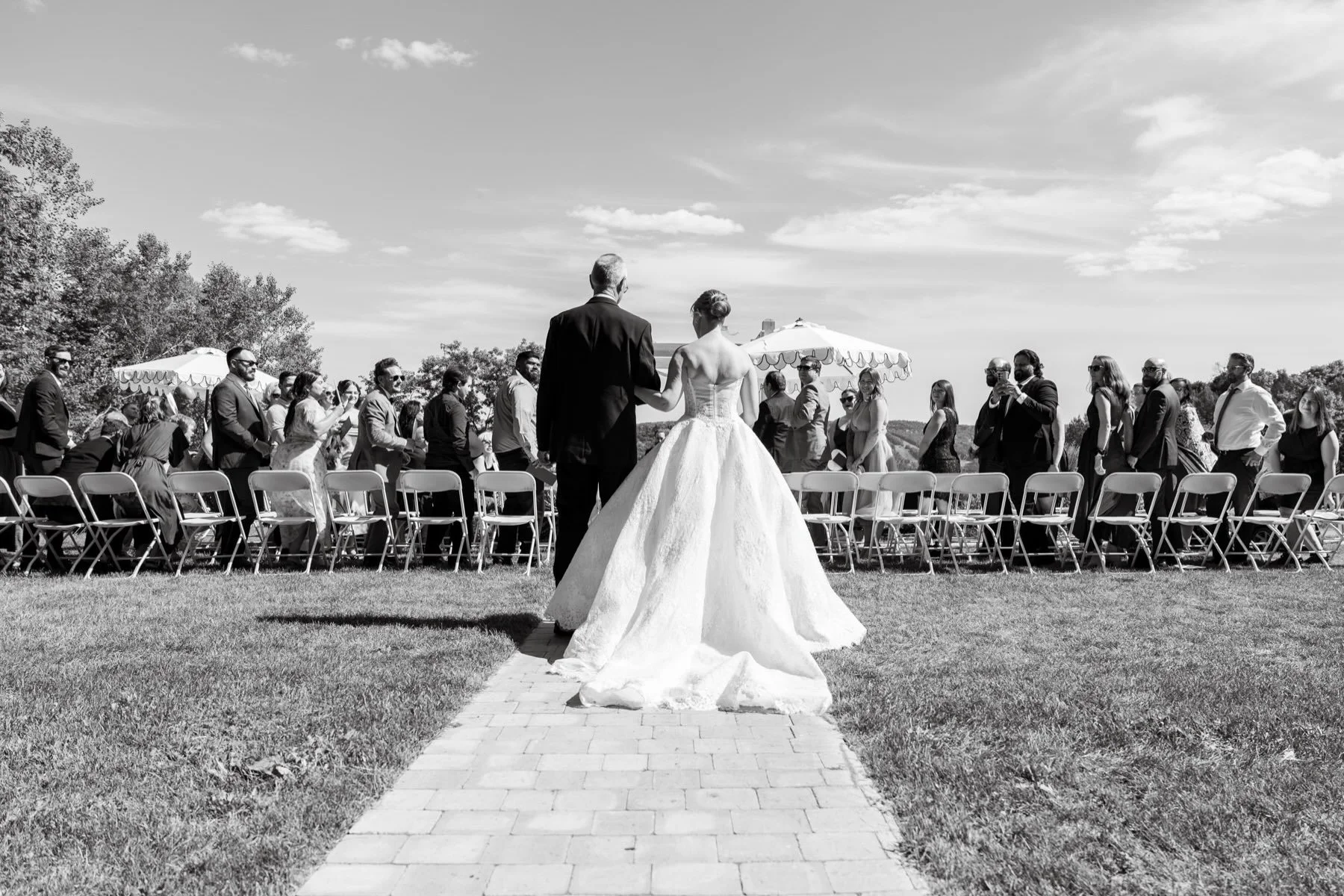 We always try to catch a standout wide shot of the bride&rsquo;s gown at the start of her path down the aisle! Gwen&rsquo;s dress was the stuff of fairytales! 

Thanks to @karishmaweddings for nailing this one for me! 🙏

[Montreal wedding photograph