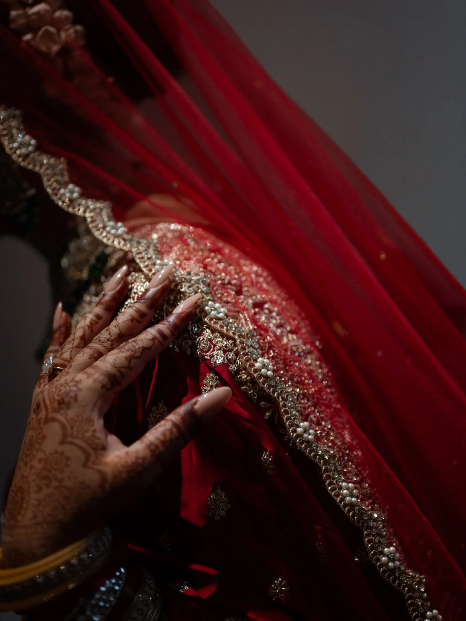 This Bangladeshi bridal getting ready transformation was brief but magical. Witnessing Uma sparkle at the sight of herself coming to life as the bride was a sweet joy to document. 

Focused on working through this beautiful wedding day collection thi