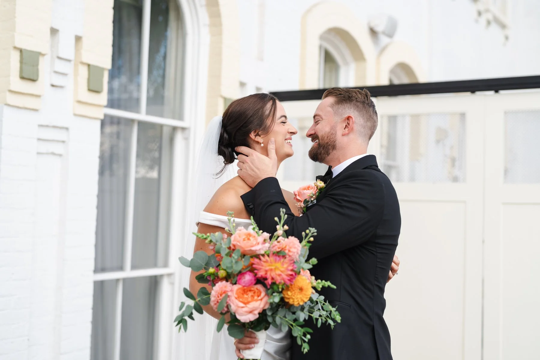 bride and groom totally in love, following their first look and ready to head to the ceremony. Saratoga Springs, NY wedding at The Adelphi Hotel. 