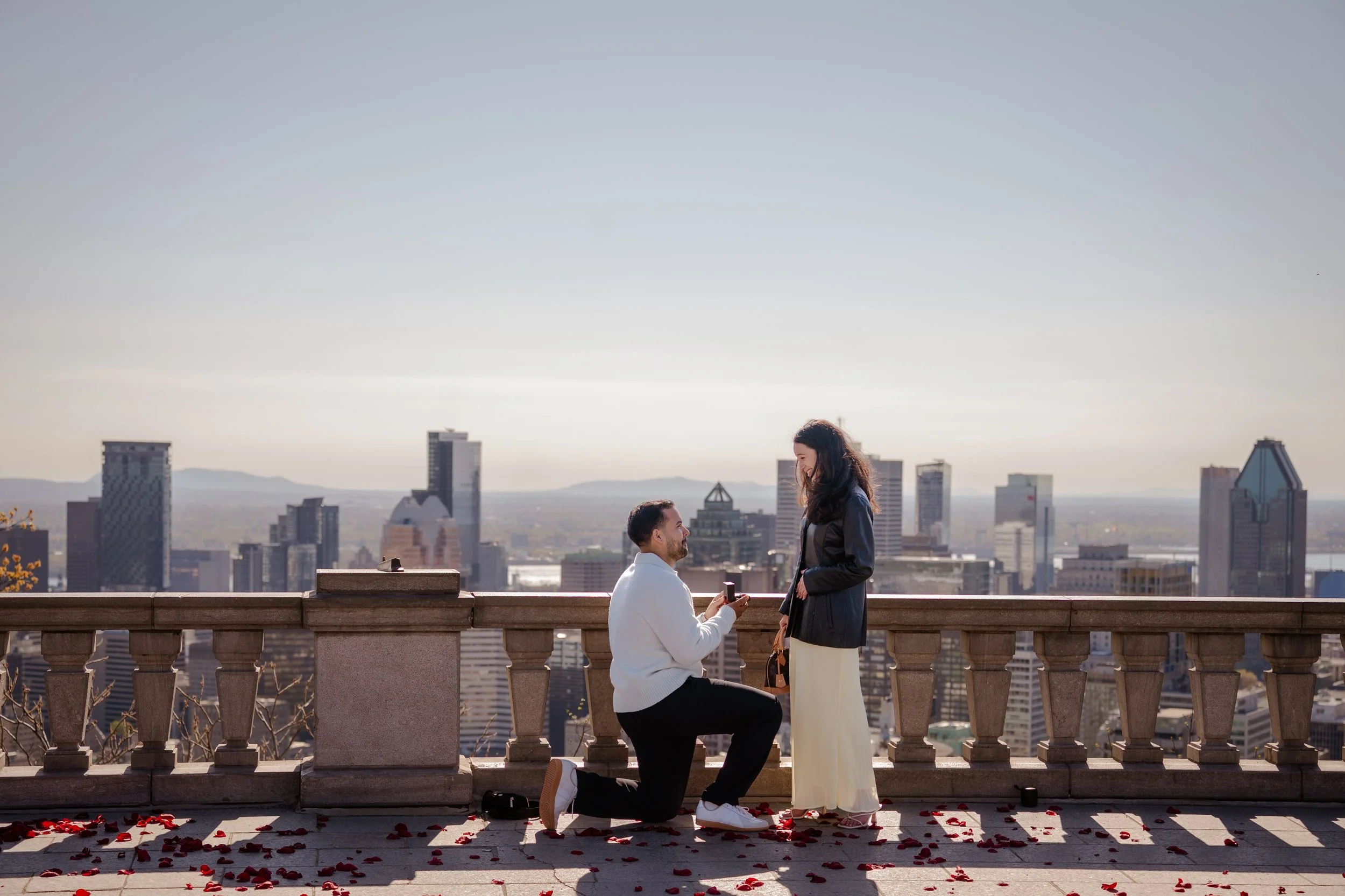 Surprise marriage proposal and engagement on Kondiaronk Belvedere Mont Royal summit by Valerie Rosen Photography