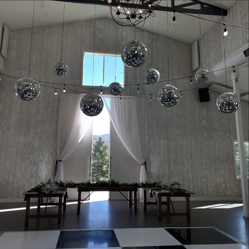 🪩disco paradise in the mountains 🏔️ 
Venue @woodlandscolorado 
Disco Ball Chandelier @ignightentertainment 
#discoballchandelier #coloradowedding #coloradoweddingplanner #discoparty