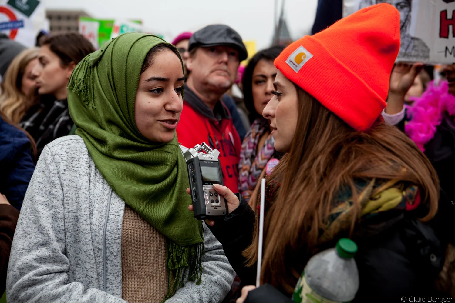 IN THE FIELD Cristina, right, reporting at the Women's March in 2017, Washington, D.C. Photo credit: Claire Bangser for The Why Women Project