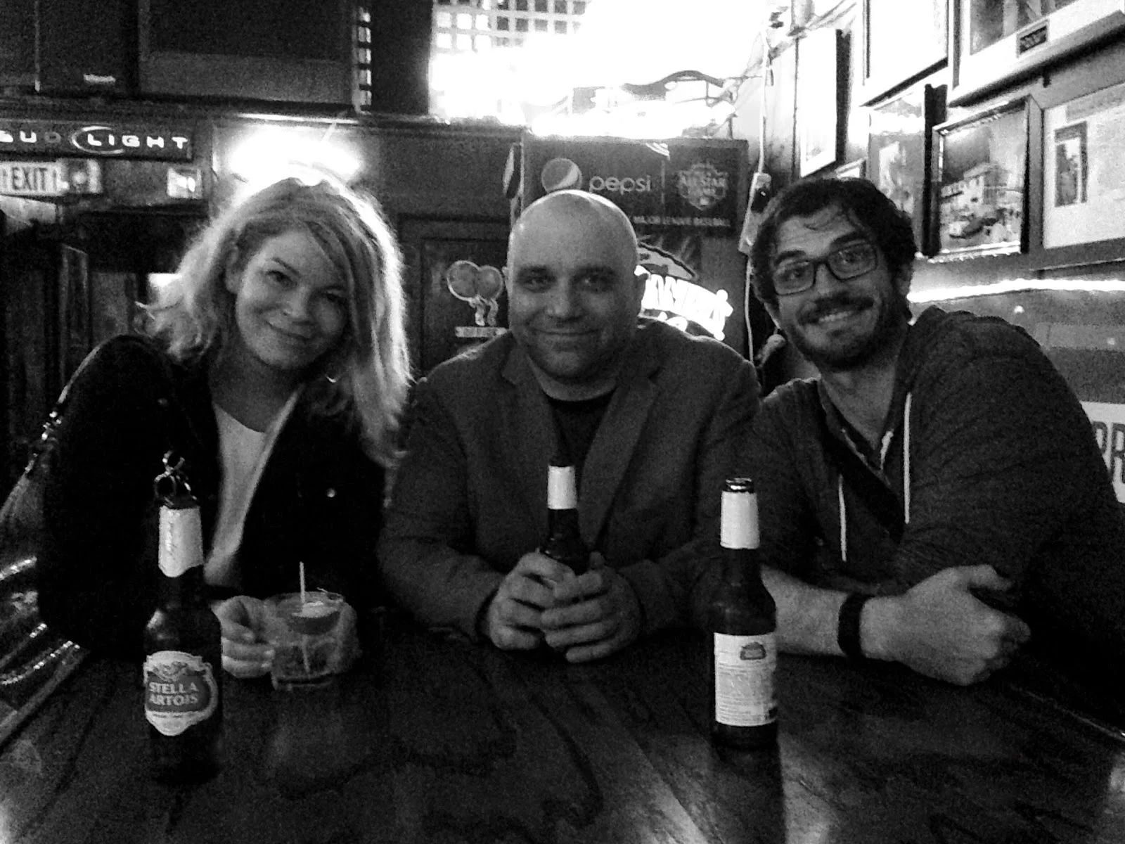 The lovely Kate Irwin from Wizard's (Gah! How did we not get a picture of Richard?!), myself, and some crazy eyed homeless guy we couldn't shake the entire weekend. The Wizards crew was the best! So much fun hanging with you guys.