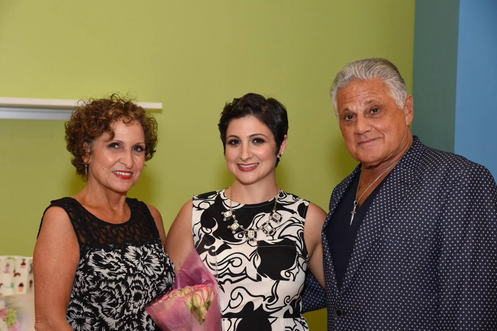 Cred-Jason-Greenspan-Helaina-with-Parents.jpg