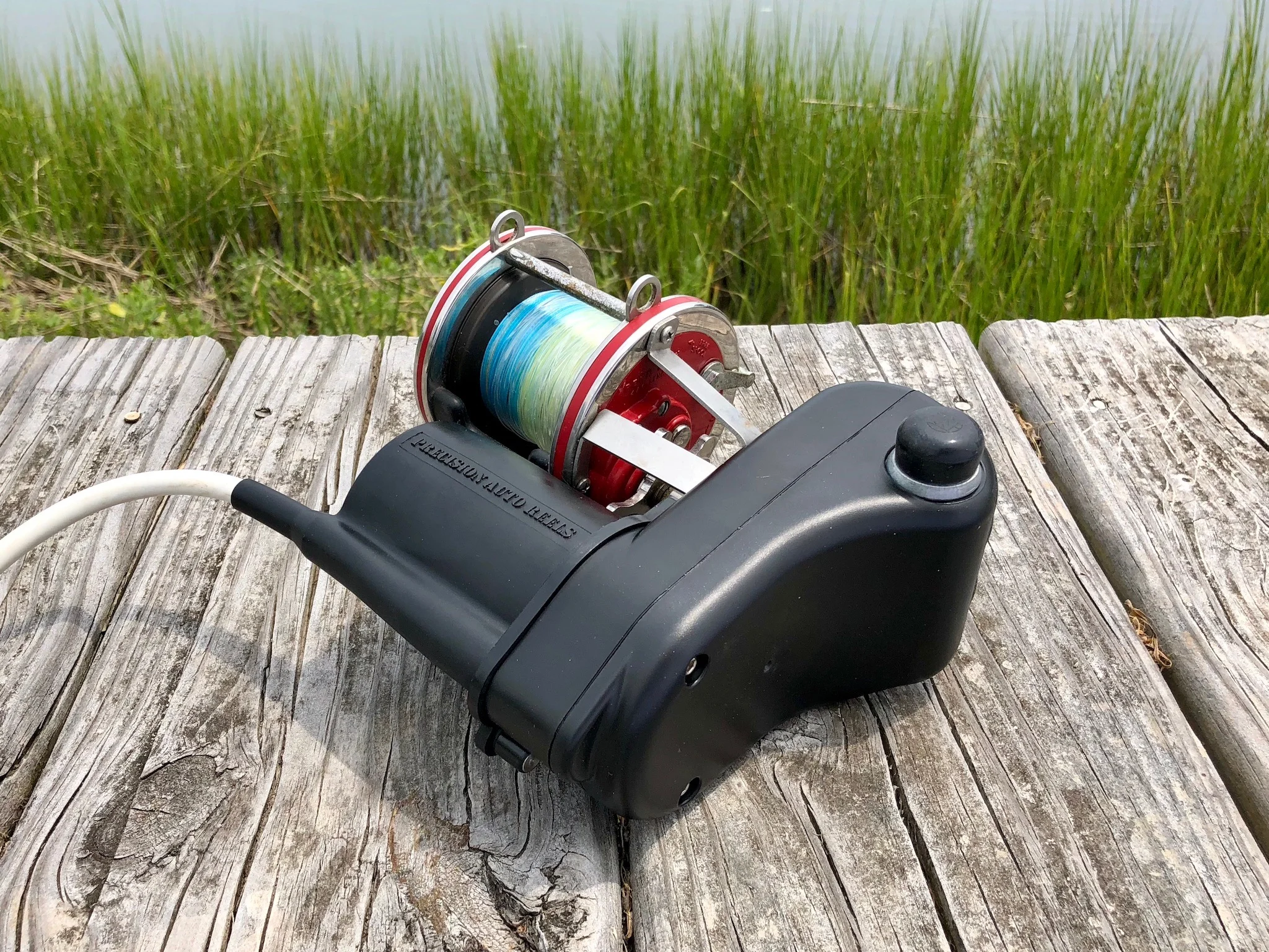 auto reel fishing Adaptive Kit handed operation for flexible use in boats where you need a free hand to paddle or pole Anyone use an automatic? :