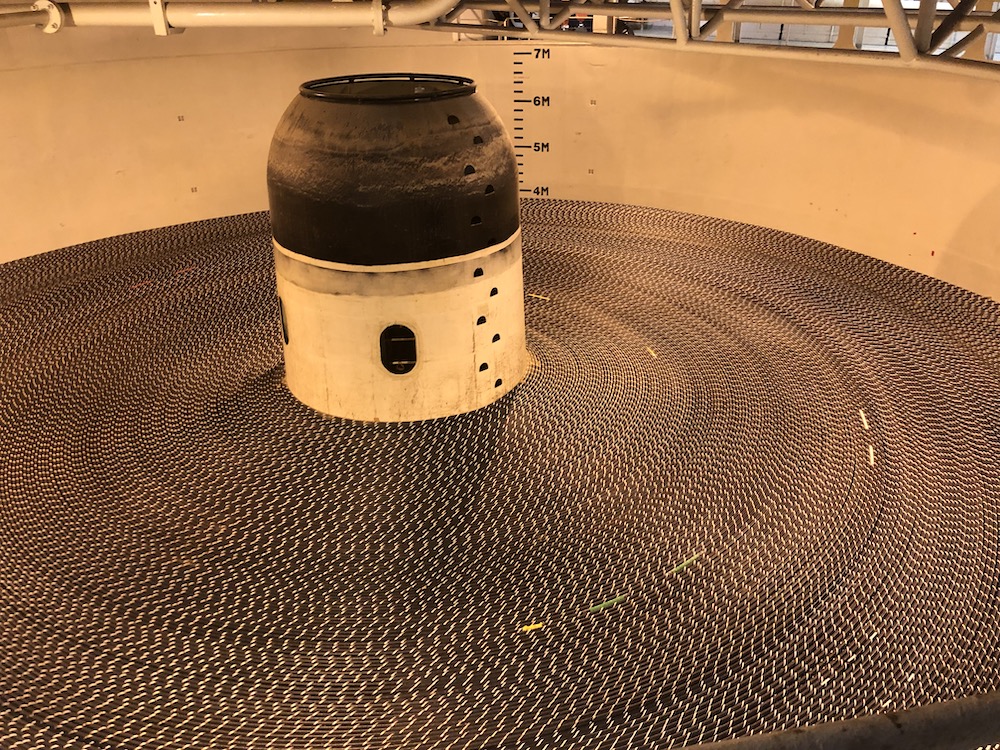 Cable being coiled aboard the ship