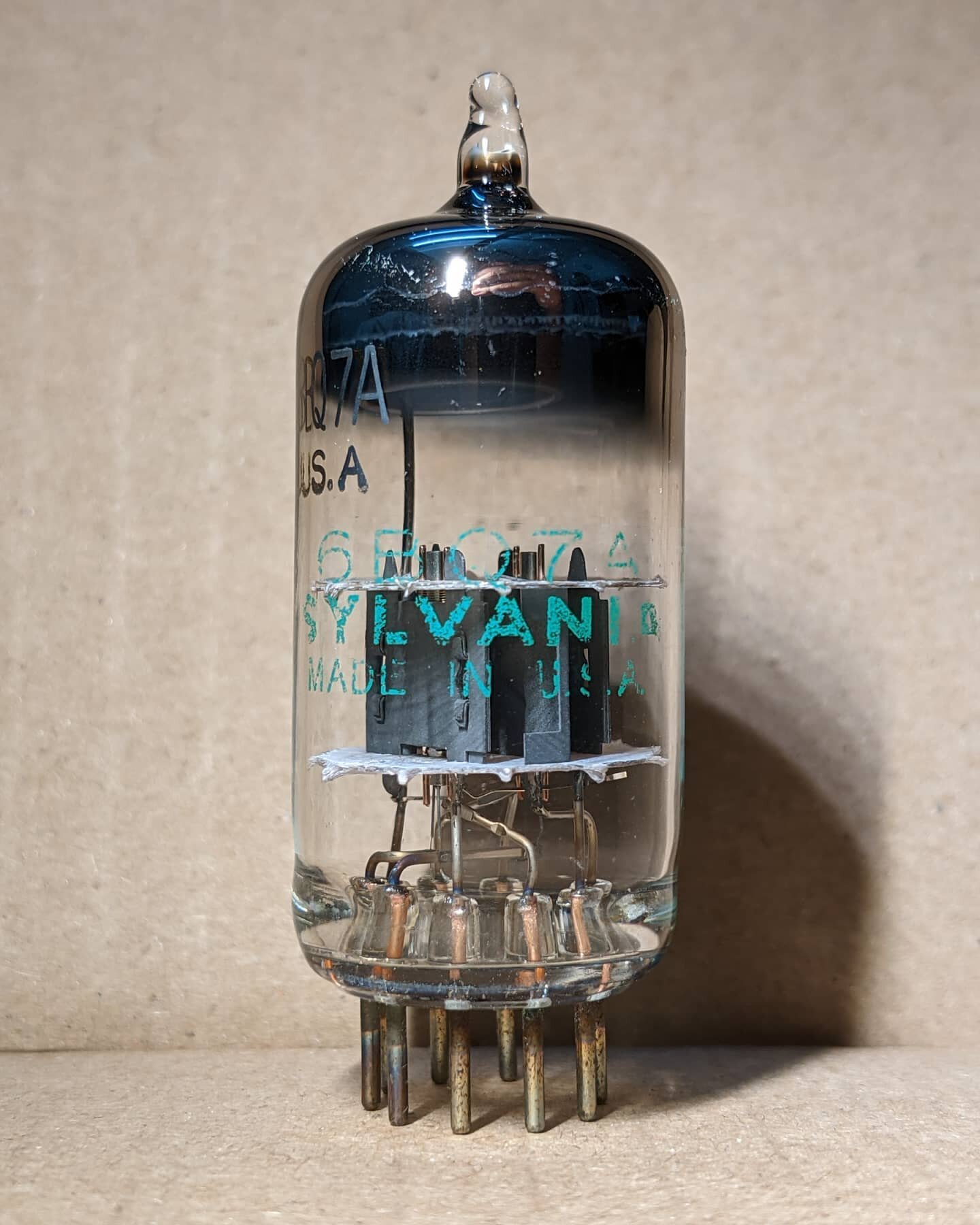 The triode was invented in 1906. It is a vacuum tube / valve with three electrodes inside a glass envelope. Around 1912, researchers recognised its ability to amplify: making a weak signal stronger. This lead to the proliferation of radio, and later 