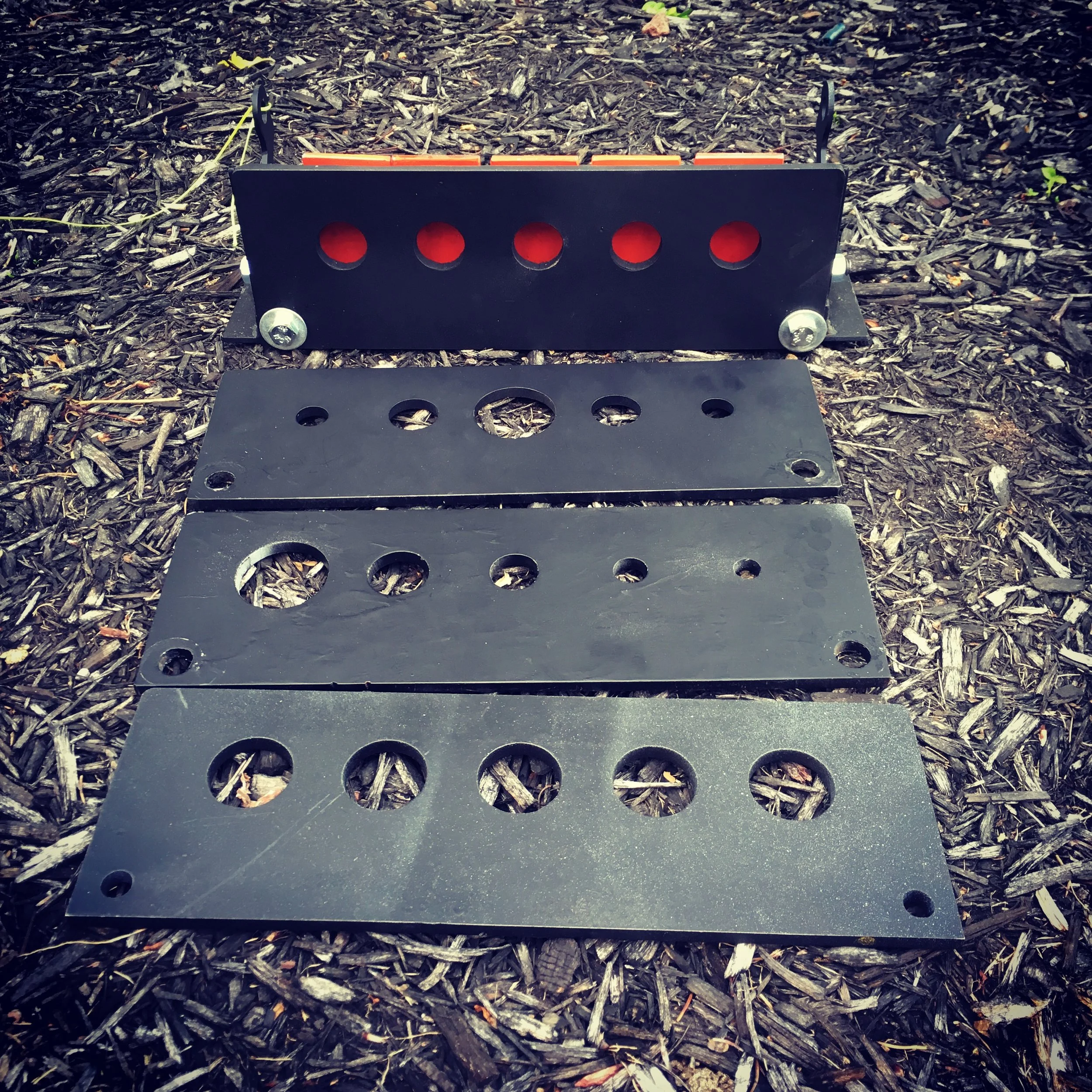 The Core Product, The Modular, Portable, 3-dimensional, Rx Target . Representing American and World field target and rapid fire shooting. Currently 70 foot-pound rated target at 30 yards. Shown here with all four configurations, demonstrating the interchangeability of the face plates.