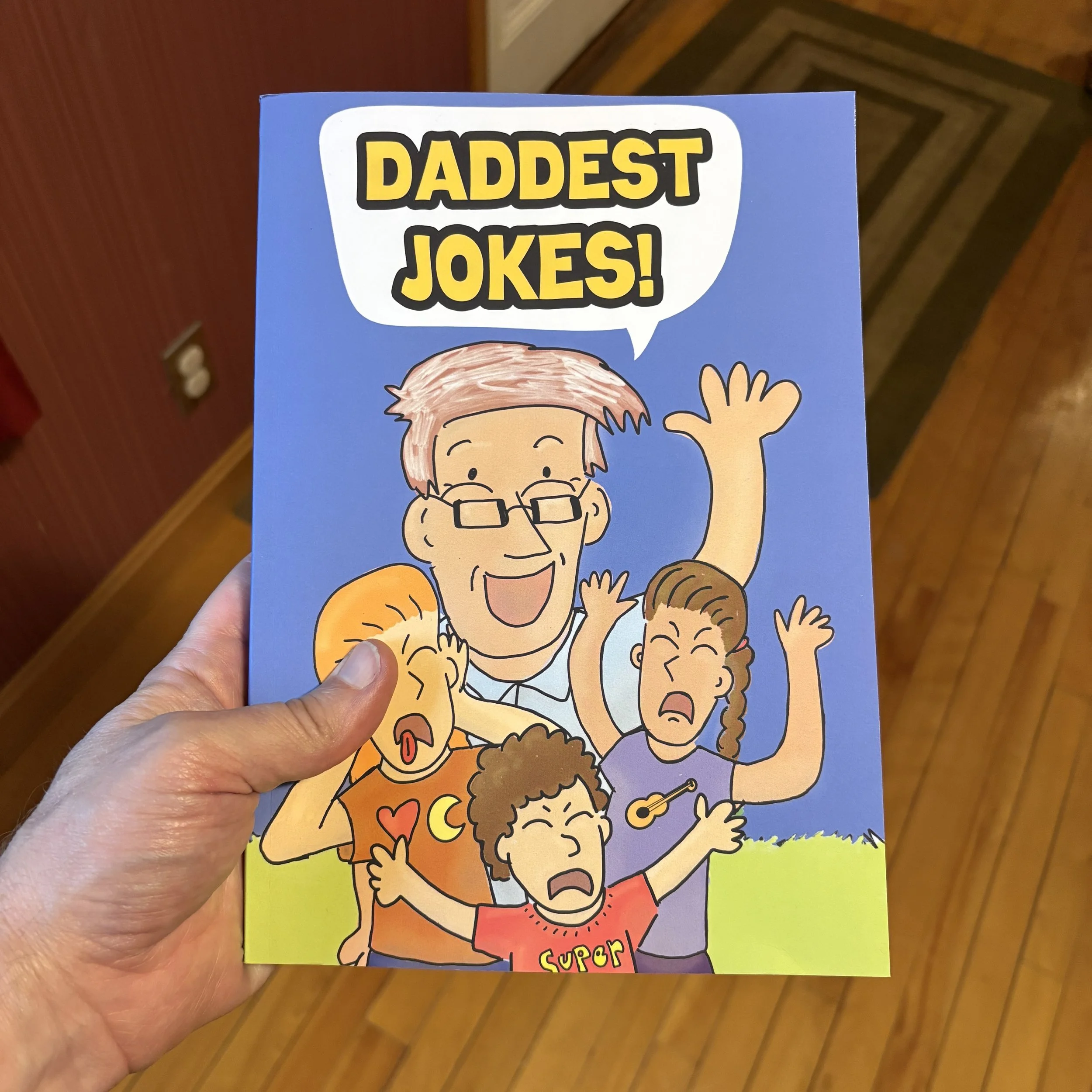 Daddest Jokes holding cover.jpeg