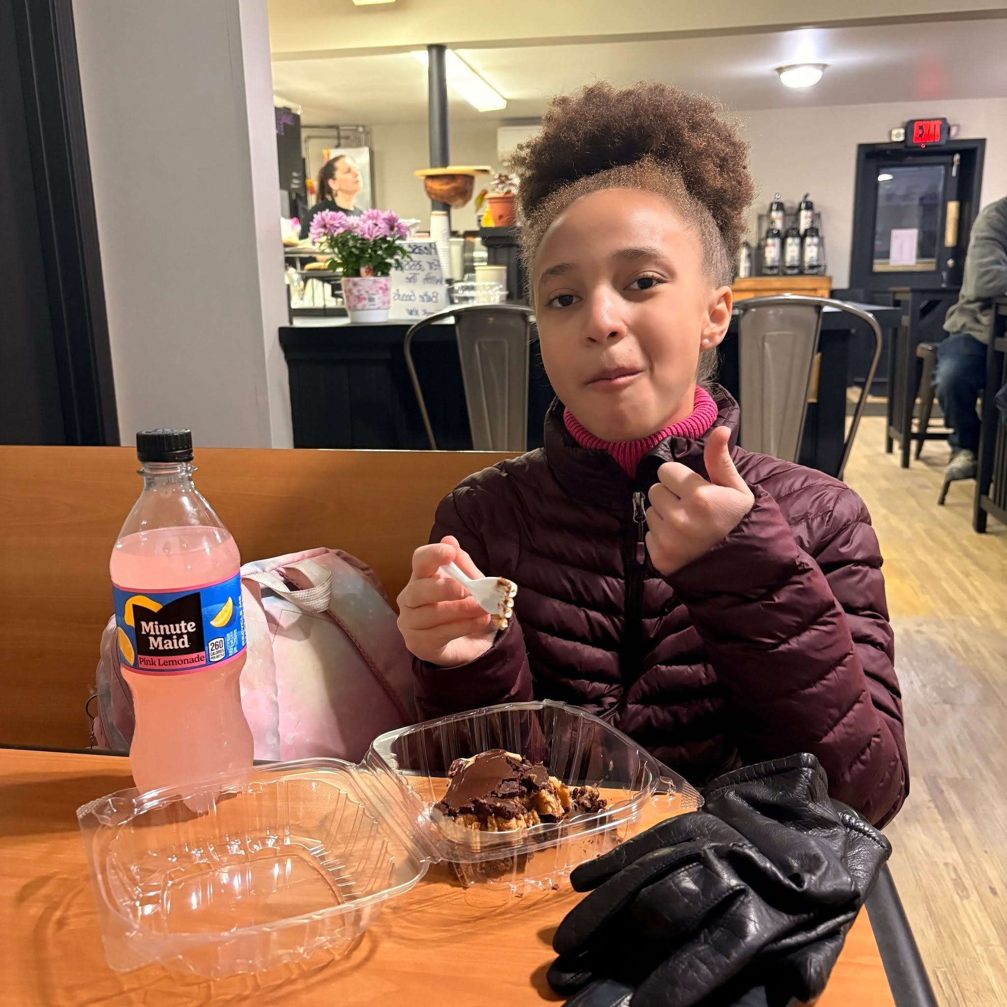Trying out the new Cafe at the end of the street. Yes, she did have pink lemonade with a brownie!