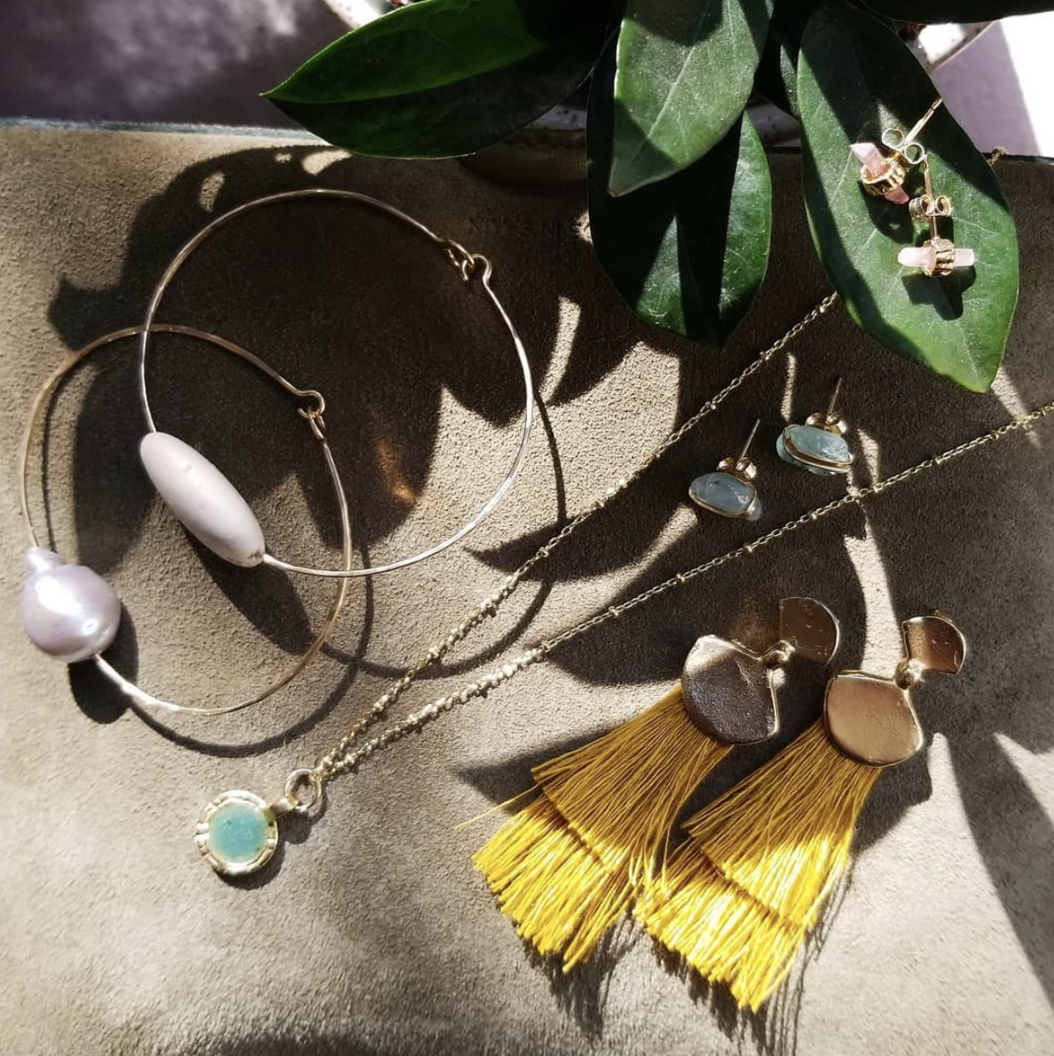 Jewelry by Mary MacGill Jewelry, Takara Design , and COG .