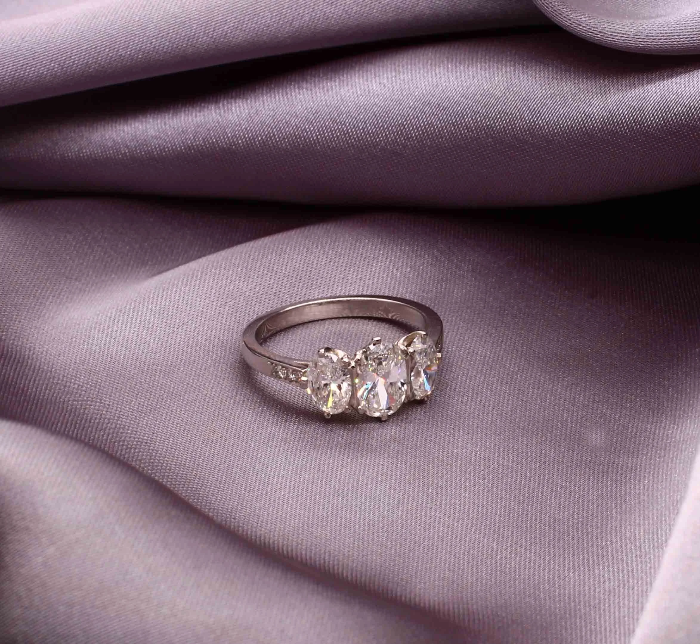 Exclusive Oval Diamond Three Stone Ring
