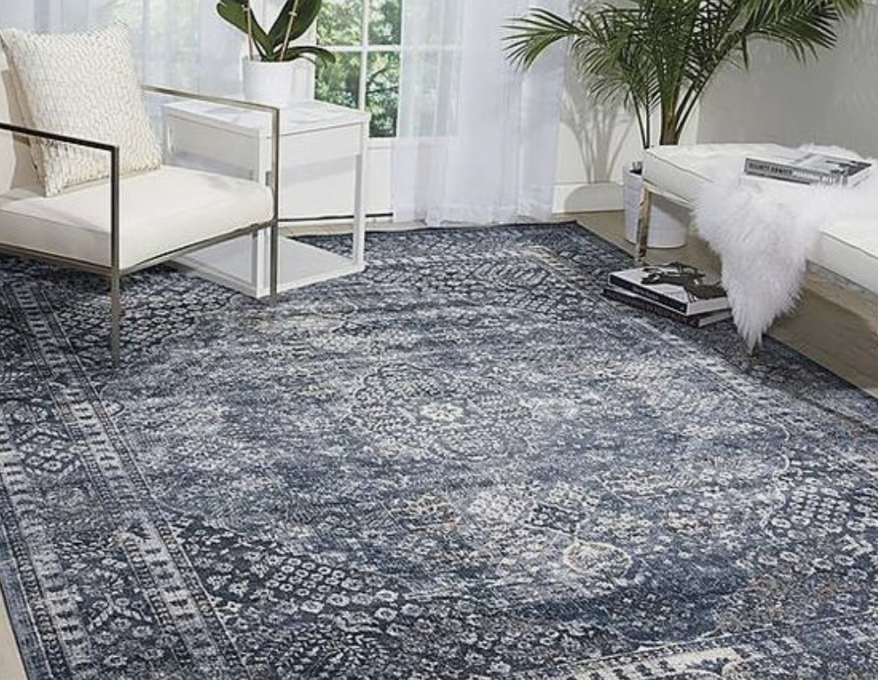 Class blue rug in living space.png