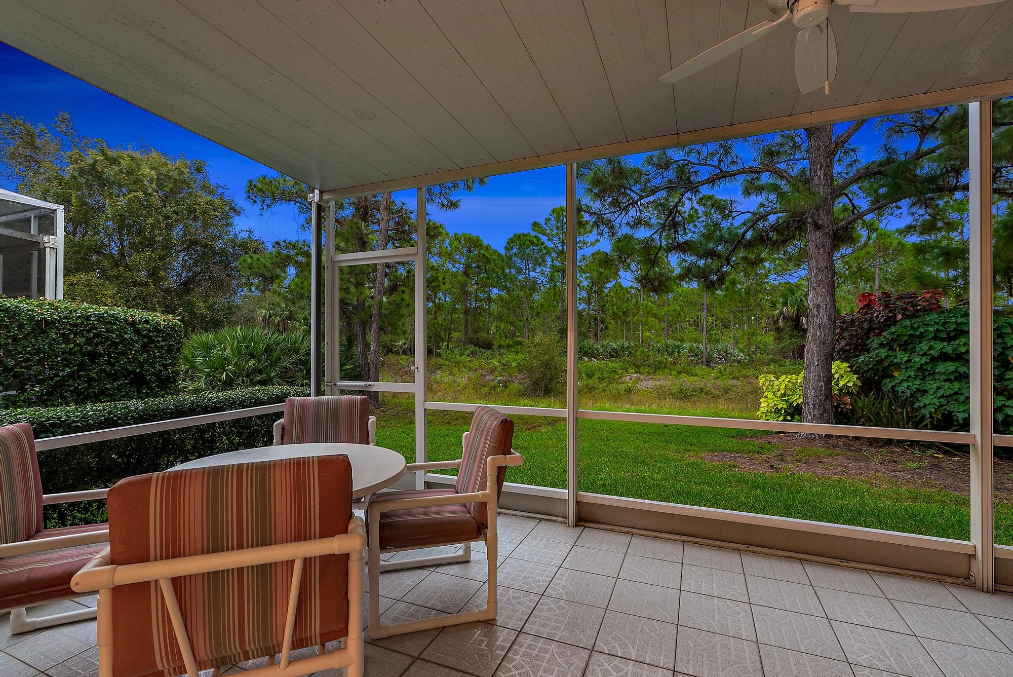 home for sale in palm city with covered patio by top real estate team