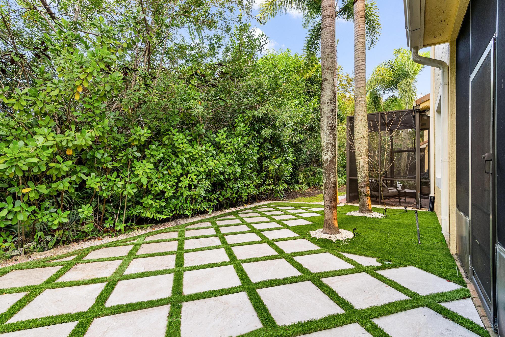 top realtors list home with stunning backyard and patio