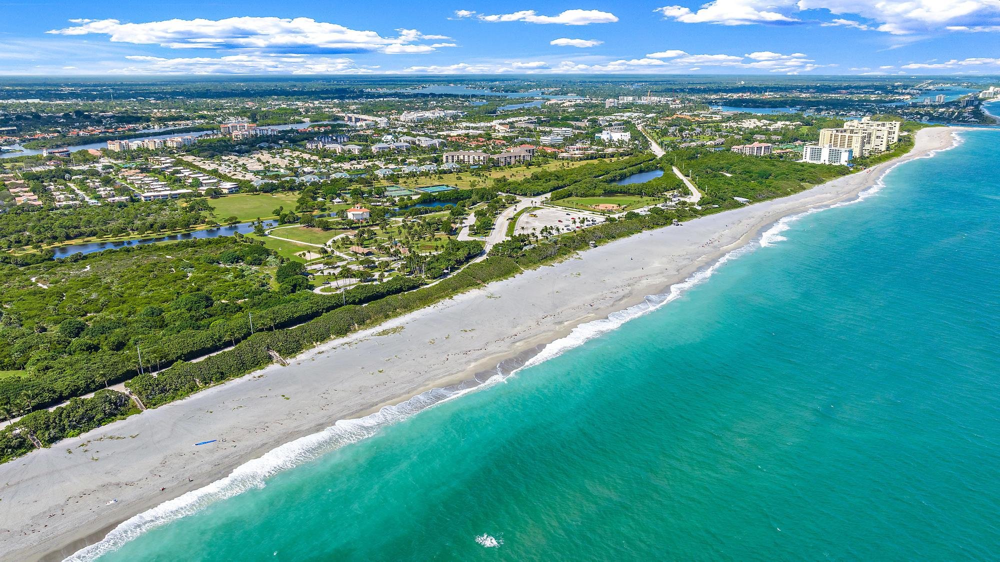live steps from jupiter's stunning blue beaches in this condo 