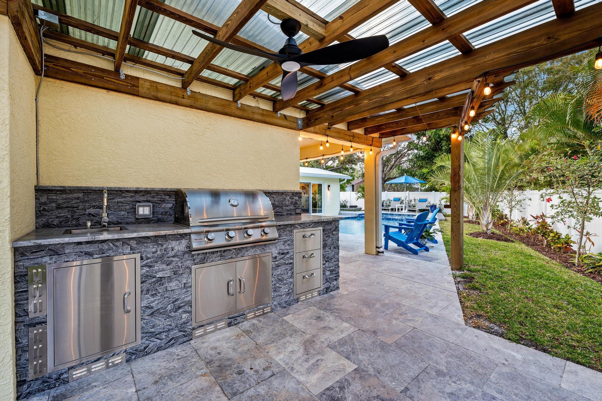 tequesta dreamy home for sale with outdoor ktichen pool 