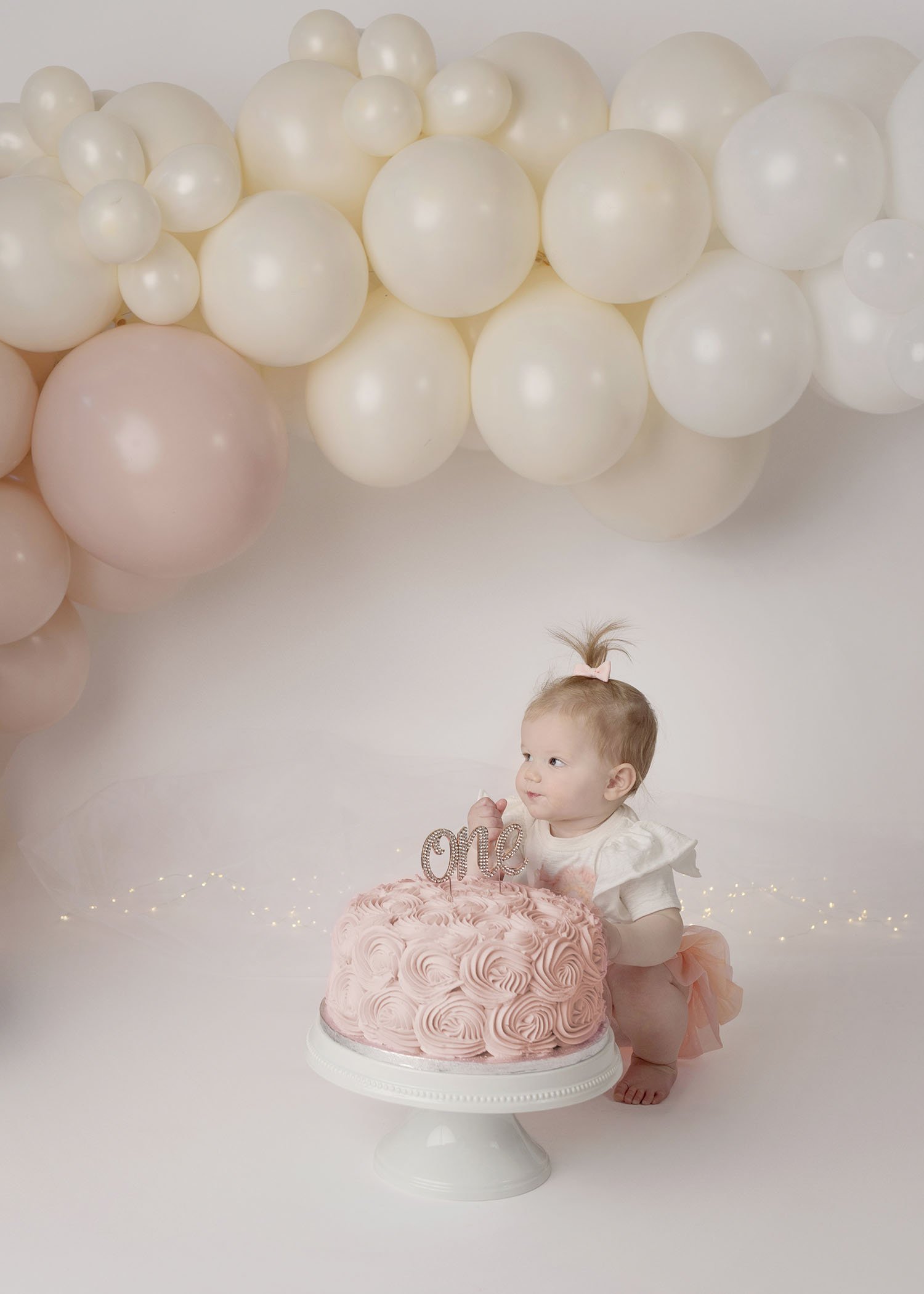 baby girl birthday cake smash photo pink.jpg