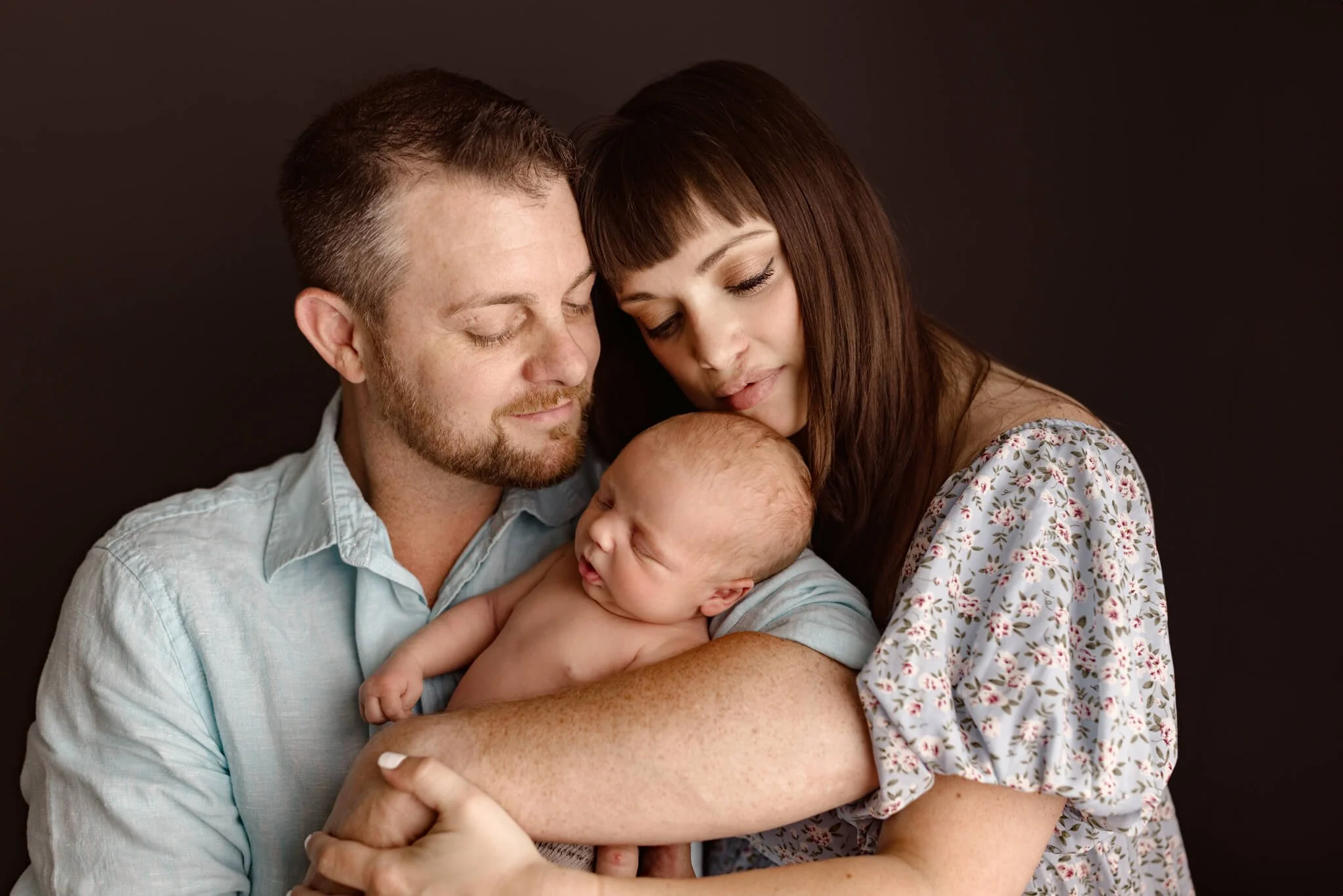 Family pose w/baby unwrapped