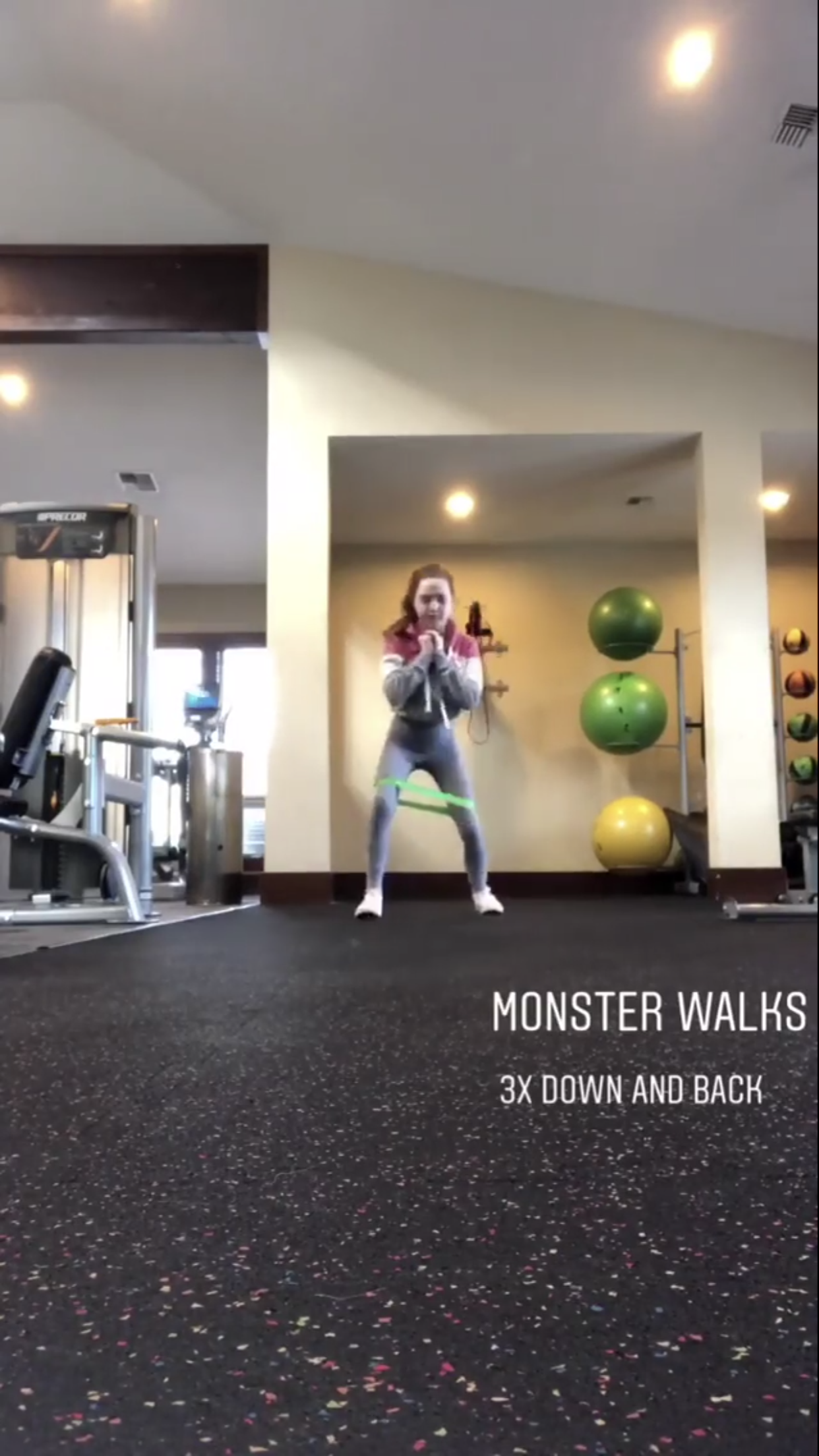 Place the band JUST above your knees. Have your legs shoulder width apart, or just a little further and get into a small squat position. Keep your back straight and stomach engaged (think sucking your belly button in trying to make it touch your back) Focus on keeping your upper body still and only moving each leg. The band should be tight enough that you are fighting to keep your knees from buckling inwards and you want to keep your knees pushing out.