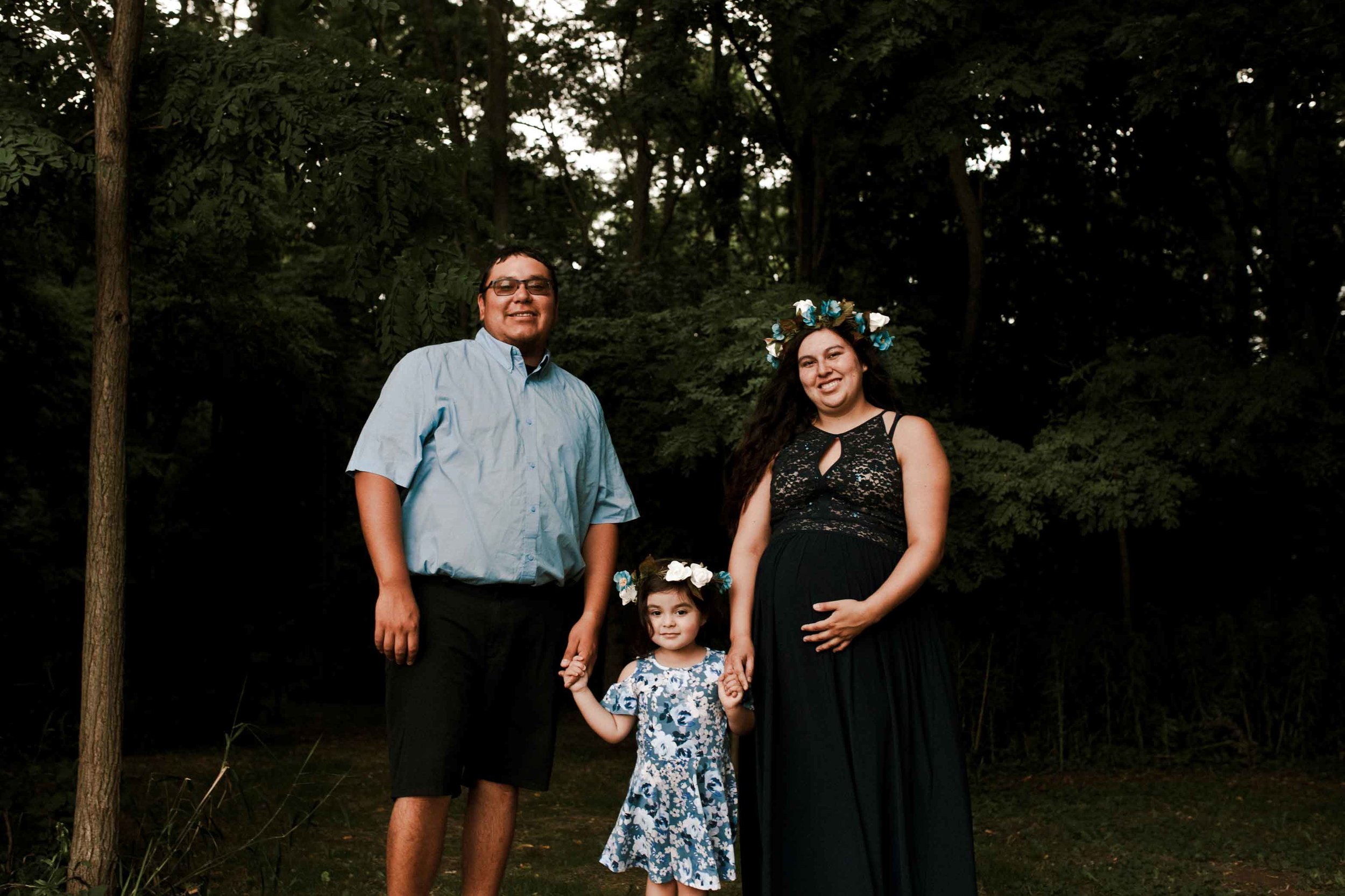 family-stands-by-forest-hamilton-maternity.jpg