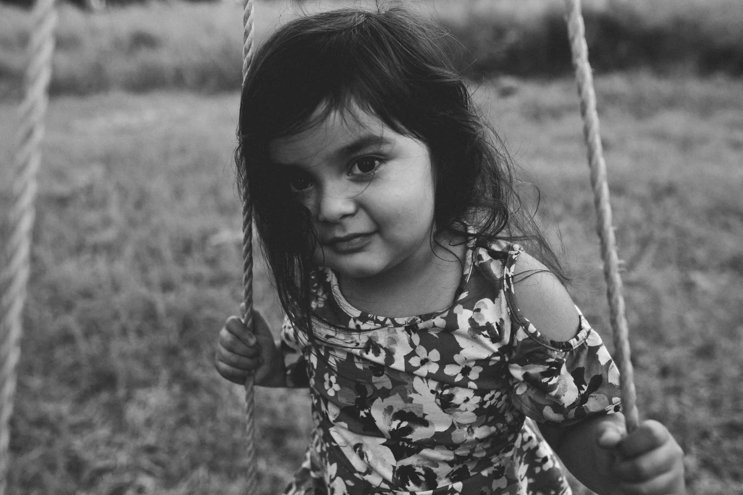 girl-on-tire-swing-hamilton-family-photographer-moody.jpg