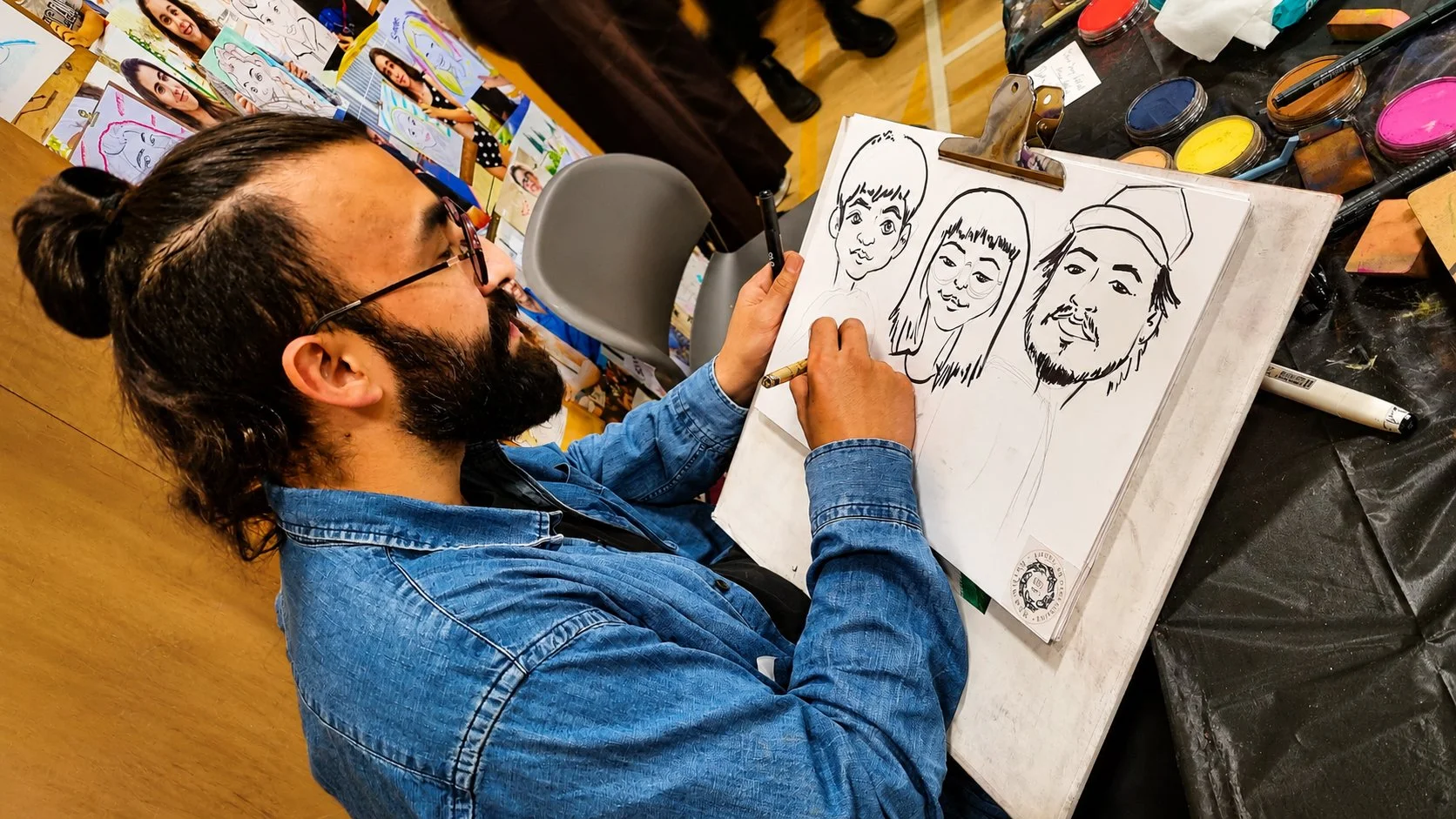 Josh_drawing_caricature1.jpg