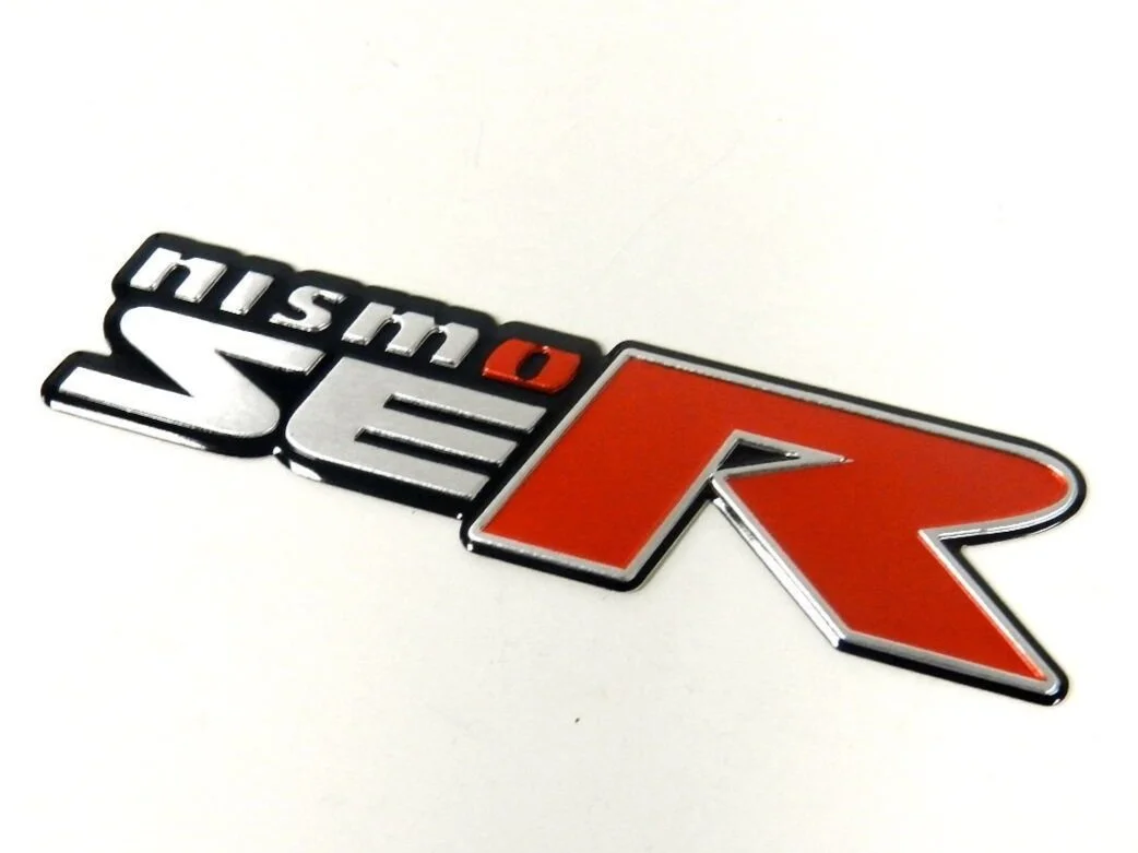 NISSAN-ALTIMA-SENTRA-NISMO-SER-SE-R-EMBLEM-BADGE-D.jpg