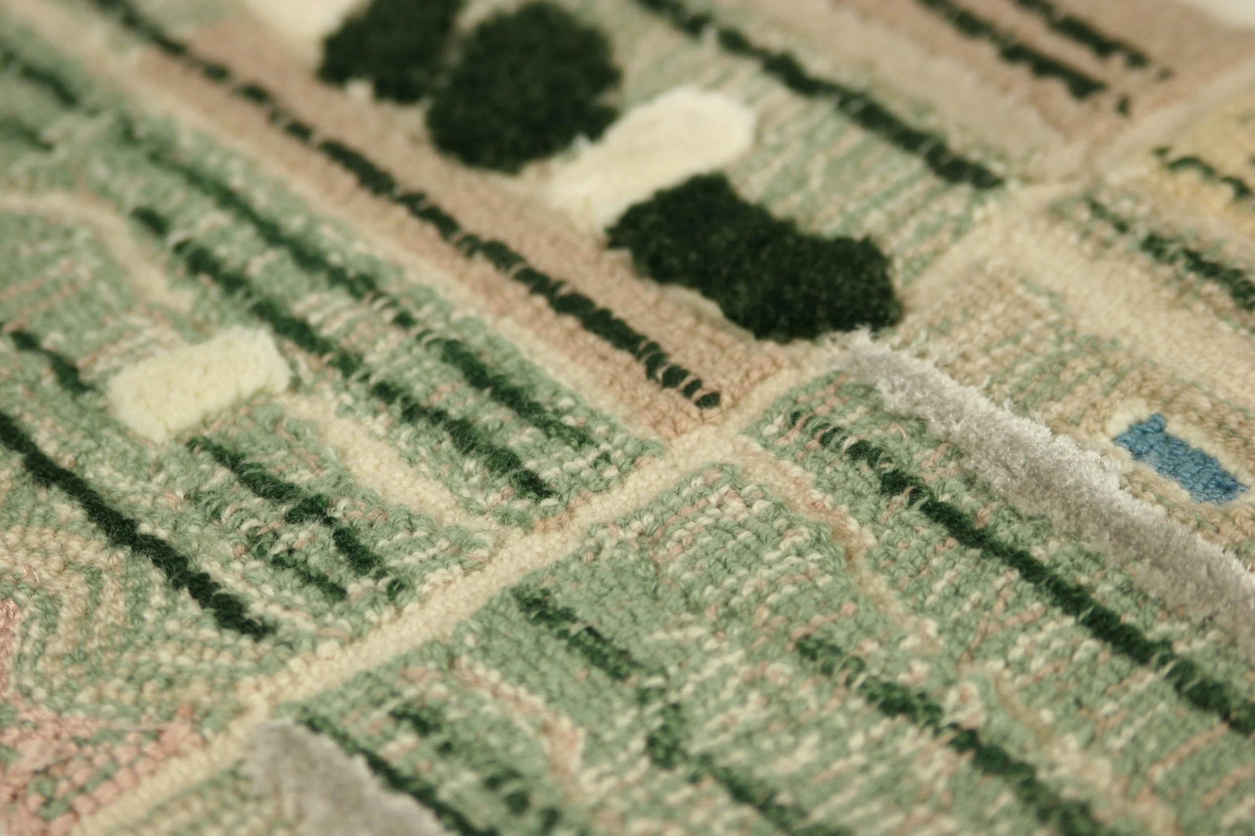 Detailed view of the 3D-tufted bas-relief work on a portion of a Tangible Archives: Epoch Collection rug by Edouard Sankowski, executed by hand by Pinton in Felletin, France.