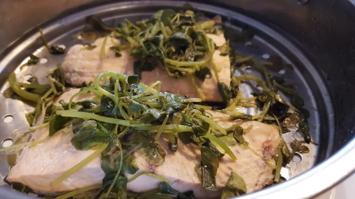 Steamed salmon with watercress