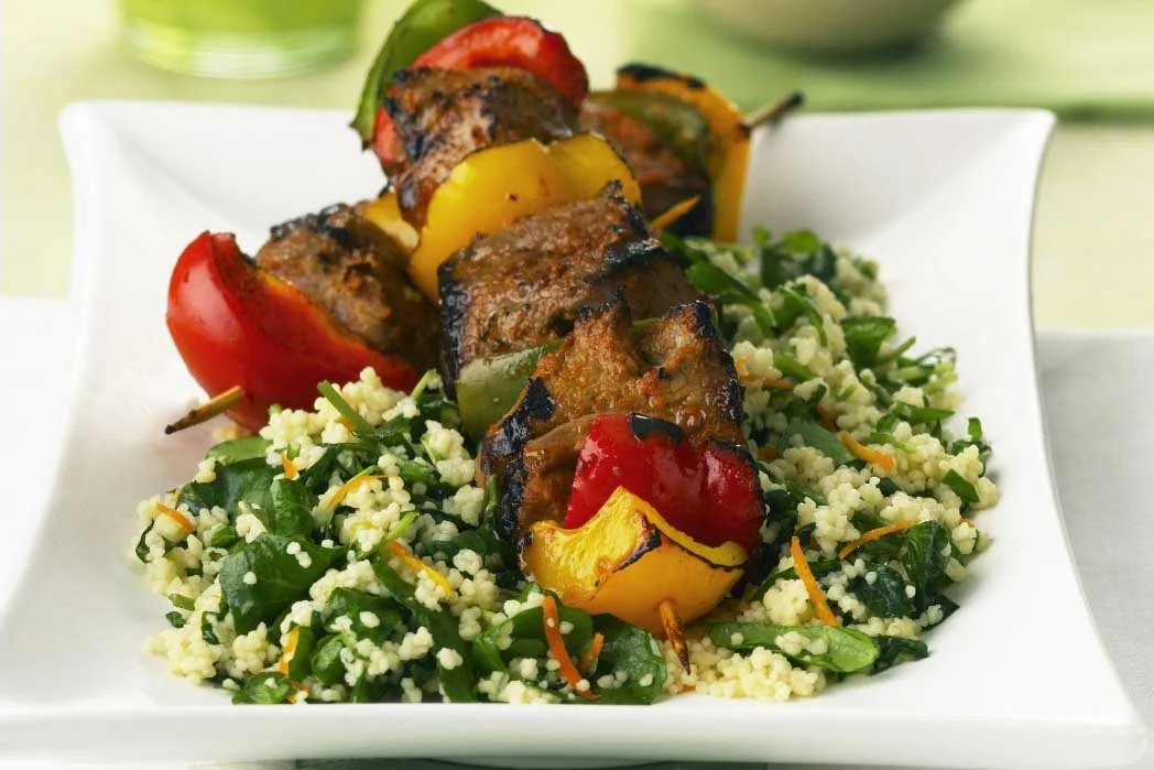 Lamb kebabs with orange and watercress cous cous