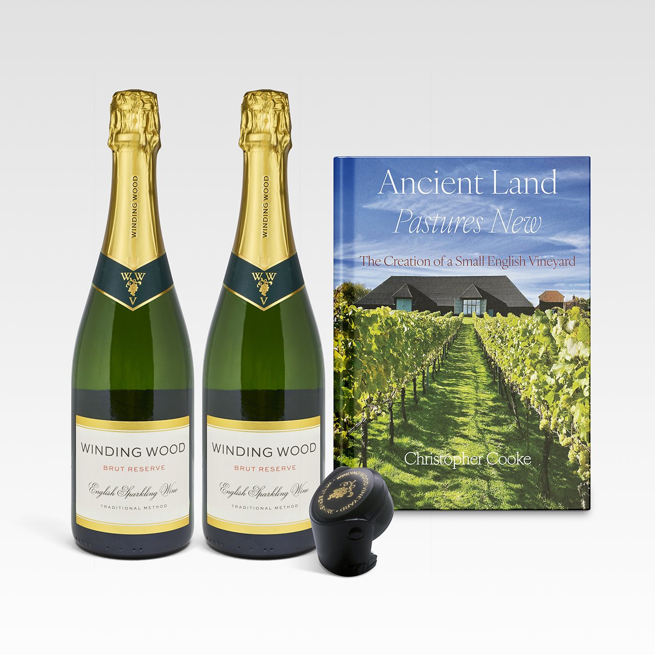 2-bottles-book-and-stopper.jpg