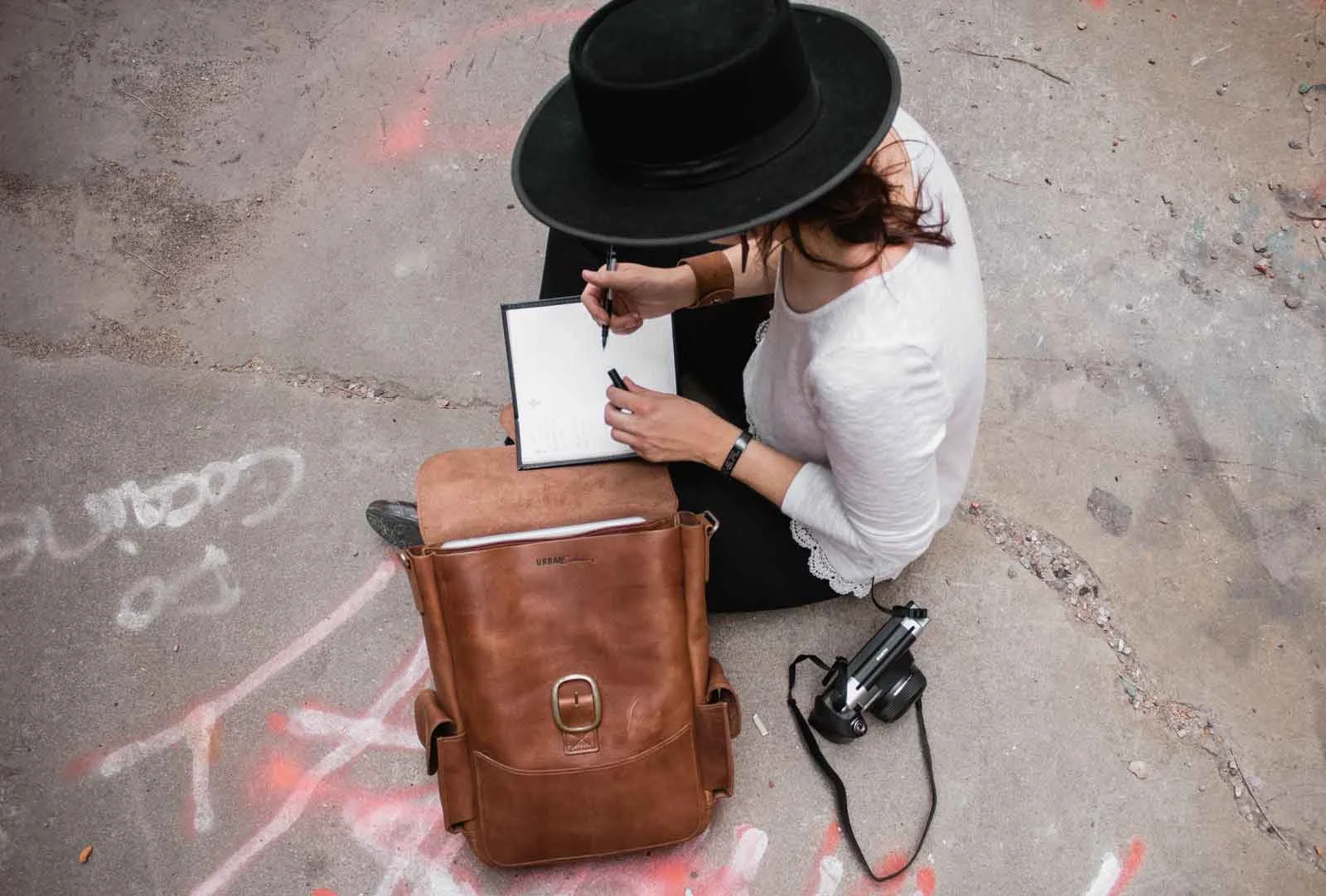 meg_delagrange_writing_author_leather_bag.jpg