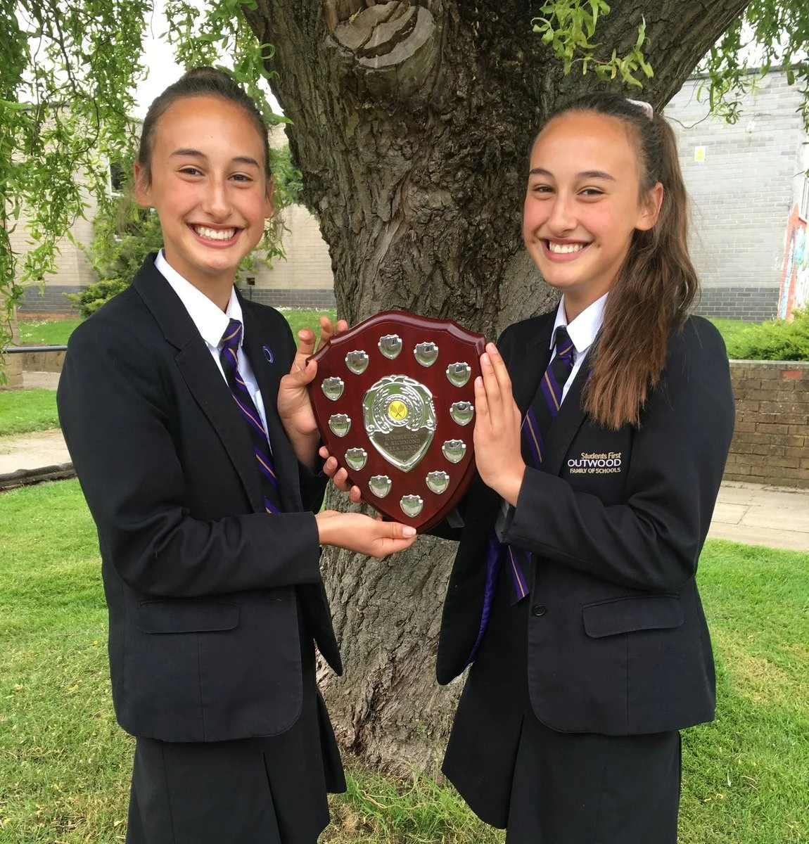 Tennis Twins Serve Up Record Success