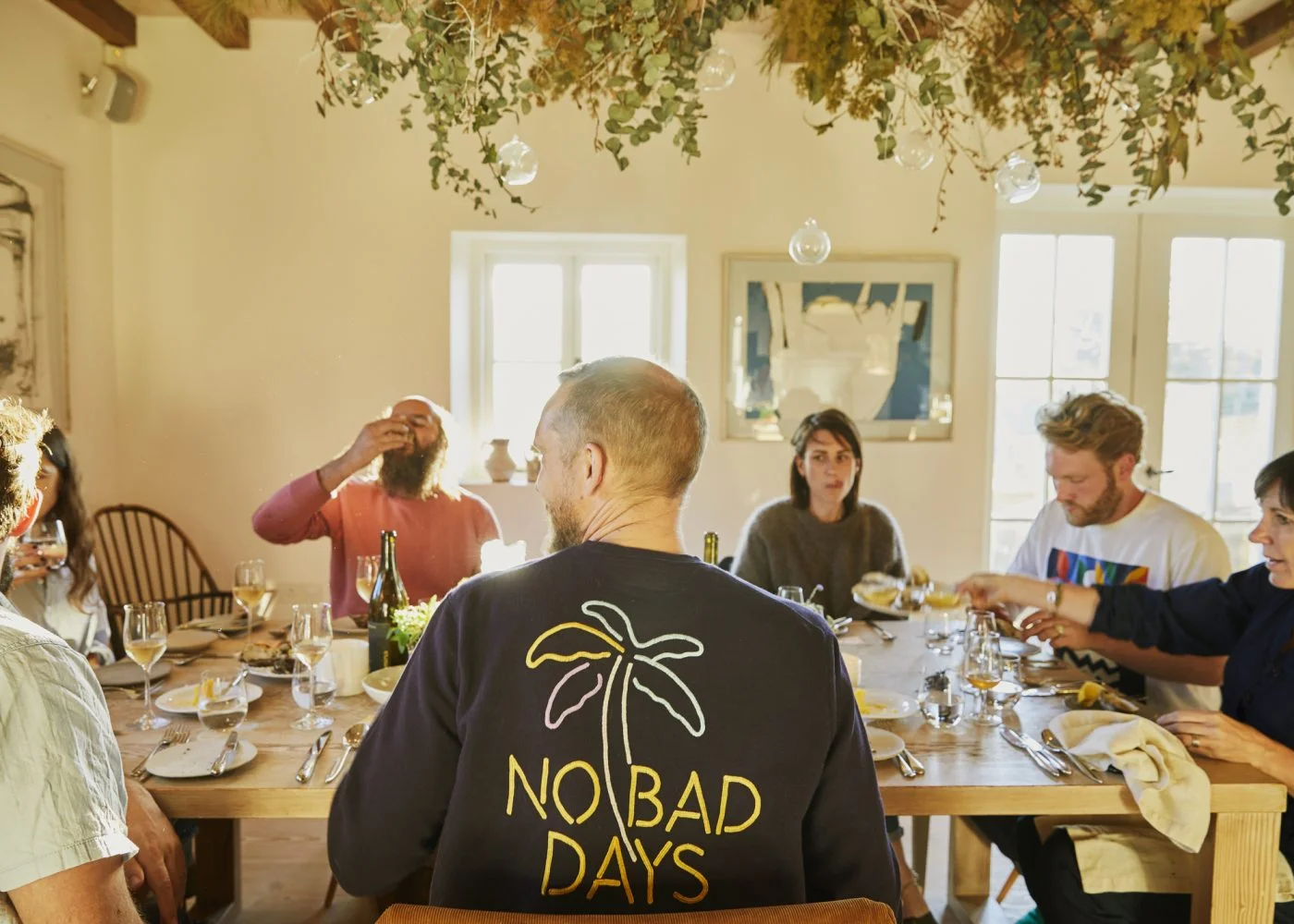 Guests enjoying their meals at Louise & Tim’s supper club. Treverra Farm, Cornwall. Photo by Emli Bendixen.