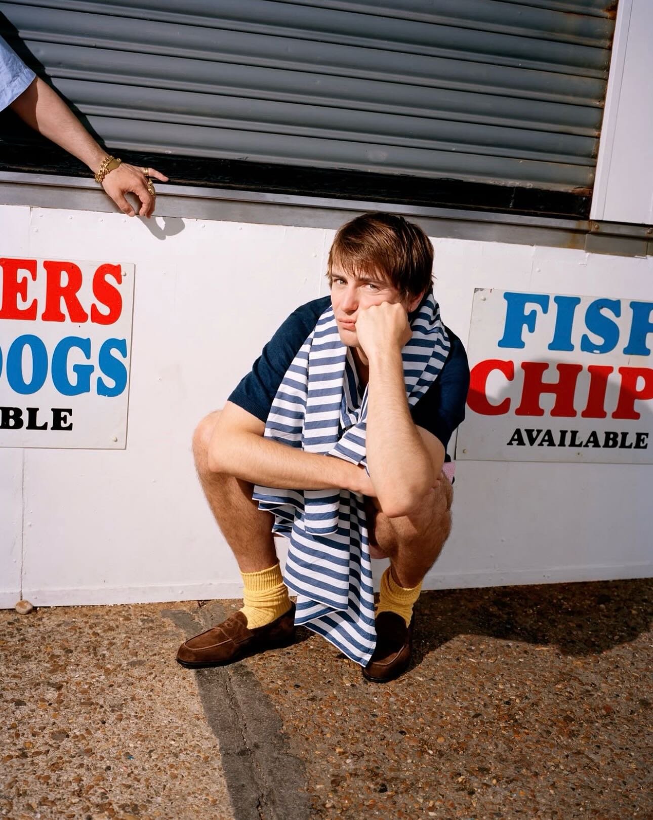 @johnlobb John Lopez Summer campaign explores the enduring appeal of the loafer throughout the long summer months, in the English seaside city of Brighton.

Photographed by Ewen Spencer, Brighton offers a fitting location for a shoe whose character i