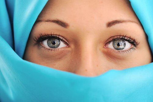 Muslim Women in blue hijab international womens day celebrating small.jpg