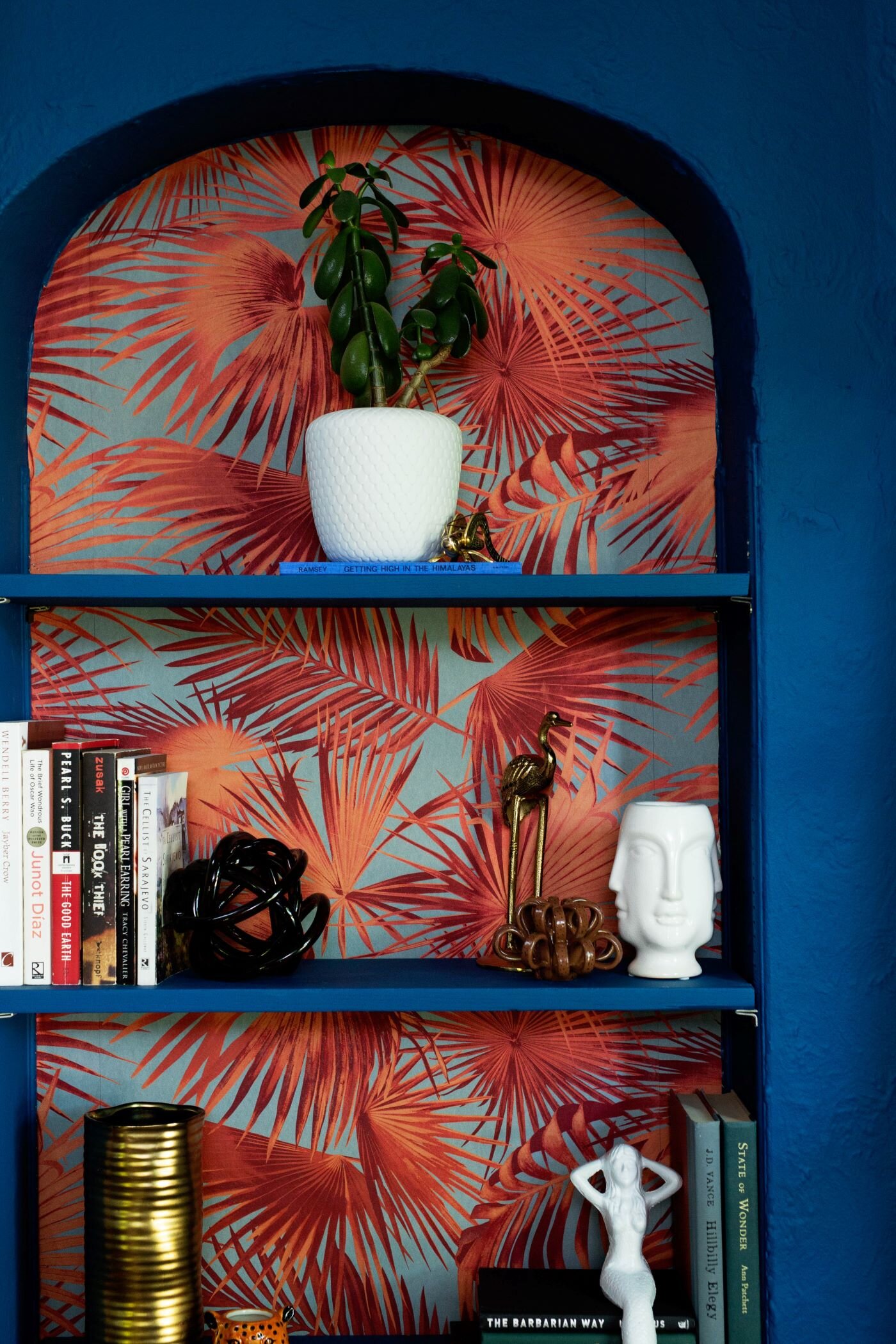 20 Blue room regatta Sherwin Williams red palm wallpaper built in bookshelf painted blue.jpg
