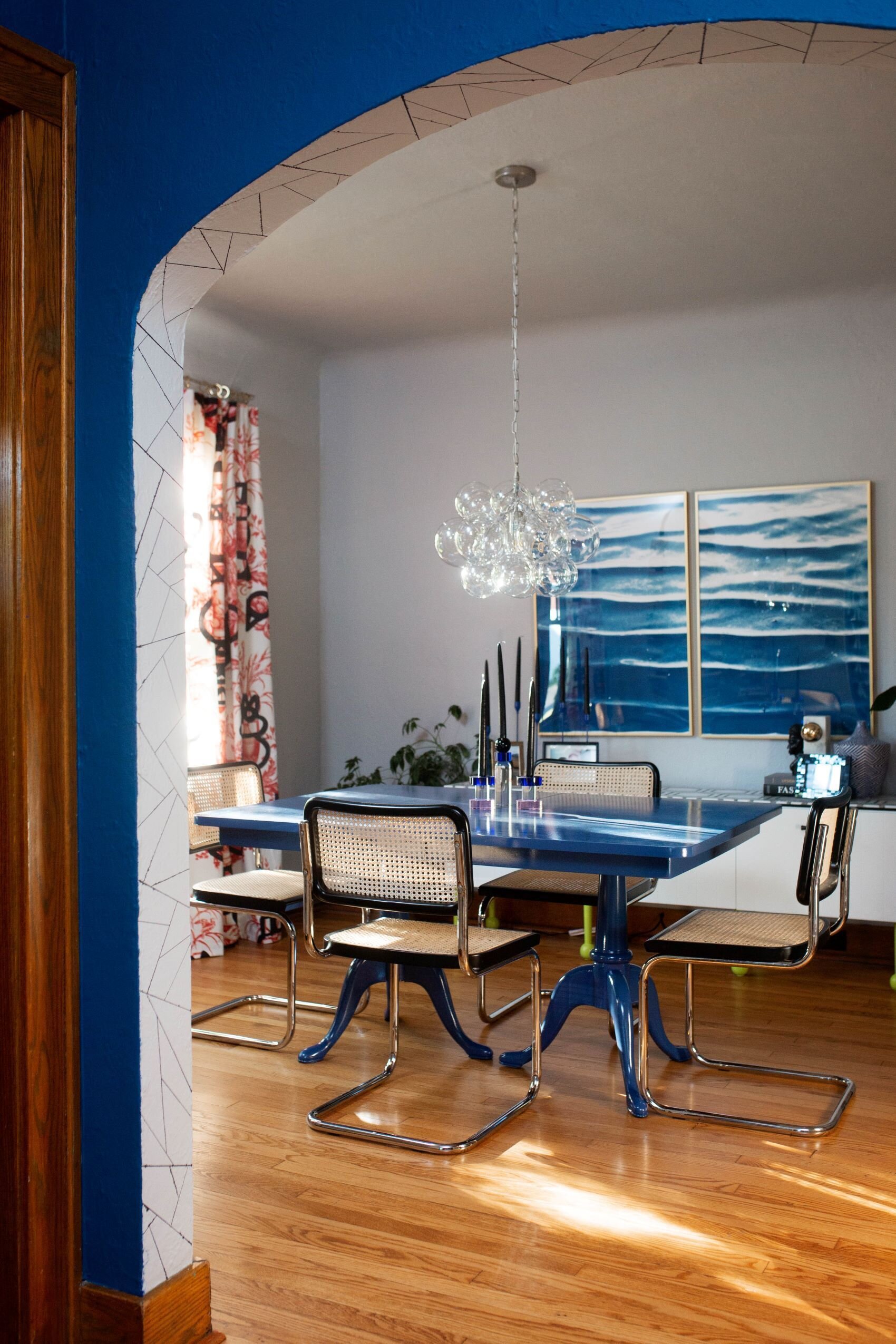 25 Blue  laquer table with black cesca chairs bubble chandelier blue modern art.jpg