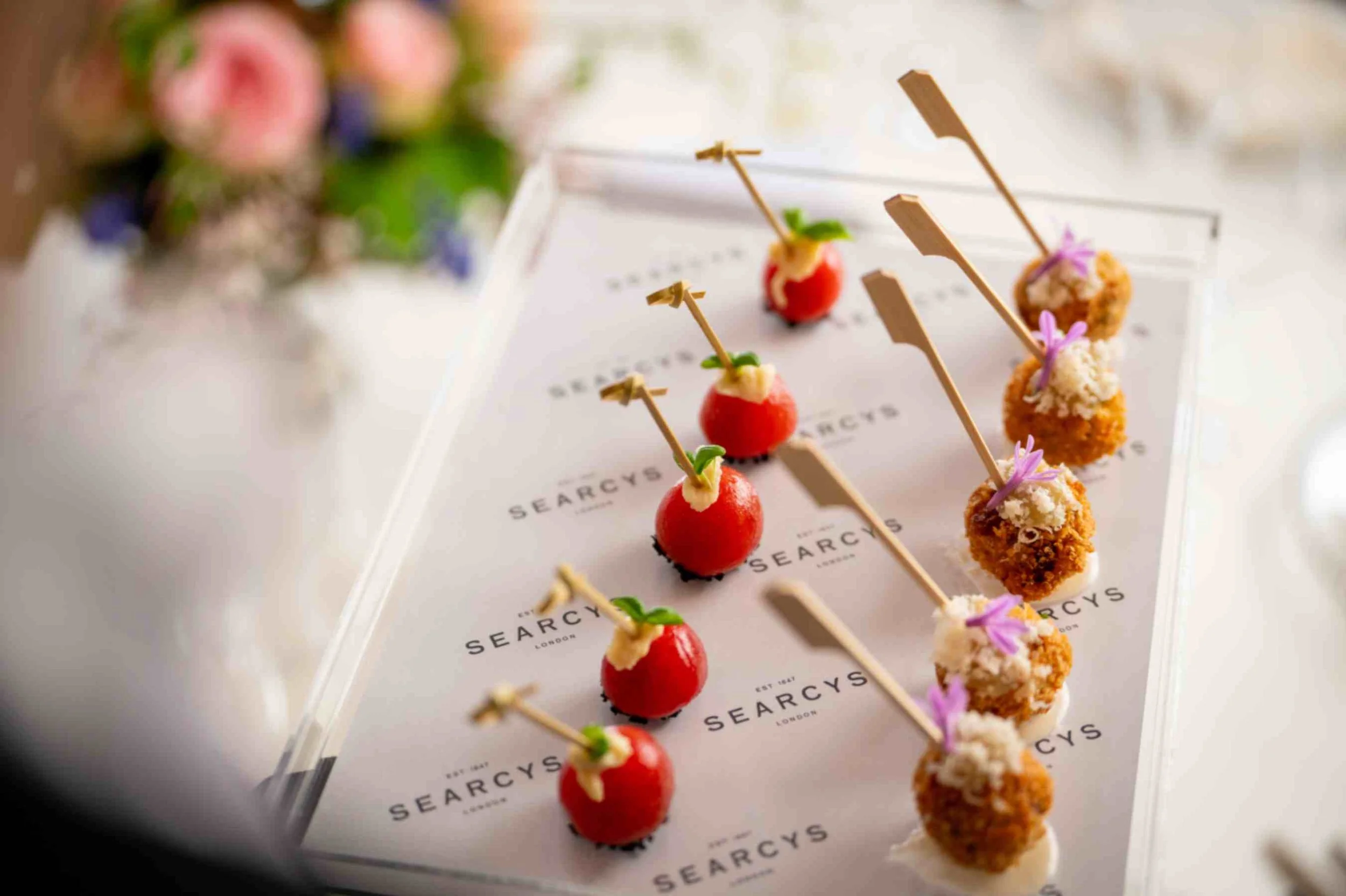 a tray of canapes by SEARCYS at 116 Pall Mall