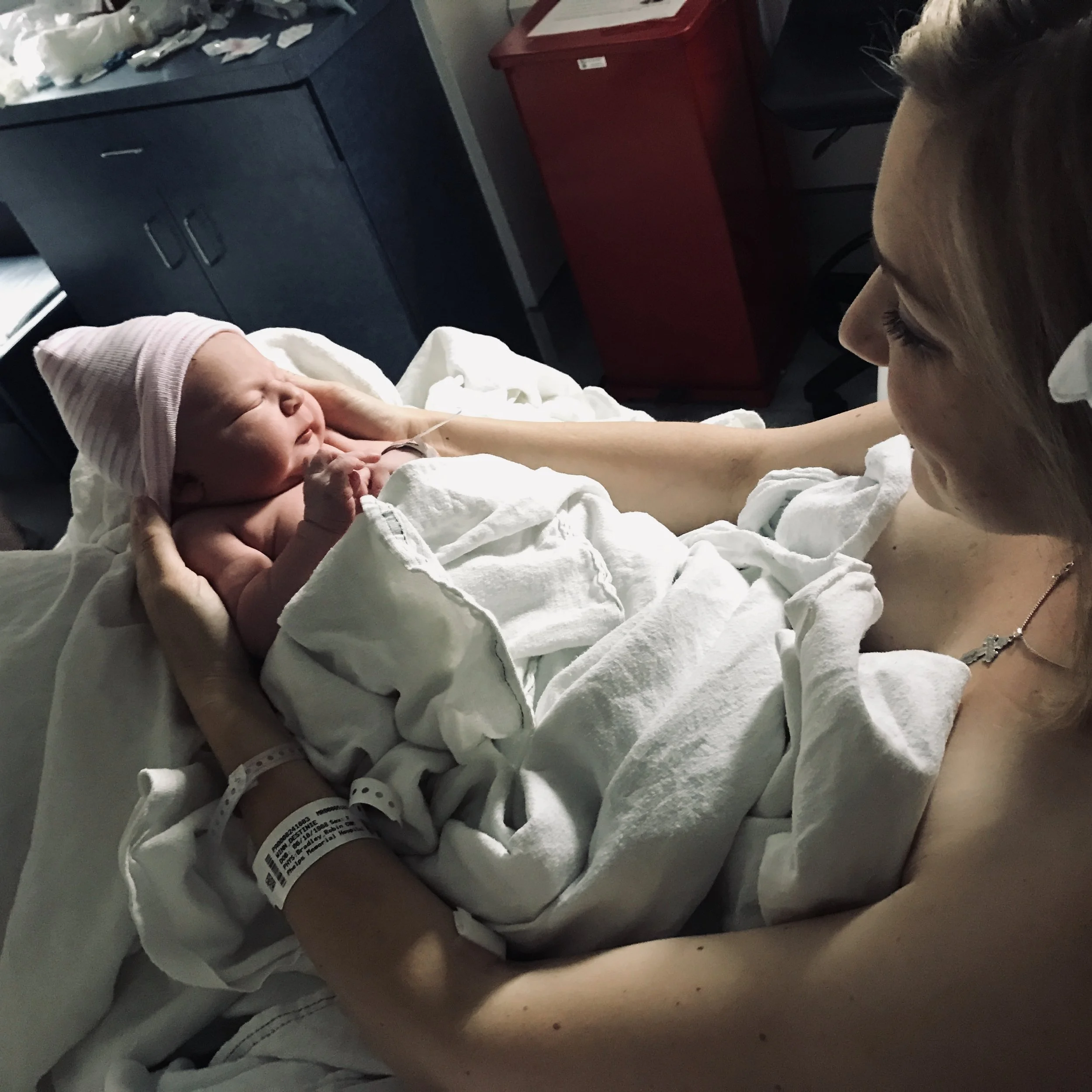Admiring this precious baby, a little bit after her birth