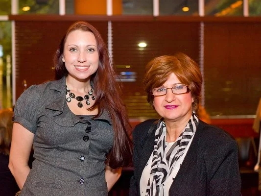 Owner of Arkansas Fashion School, Jamileh Kamran, and Meredith Events’ Owner, Meredith Corning at the Your Girl Friend’s Closet event benefiting the nonprofit, Women and Children First.