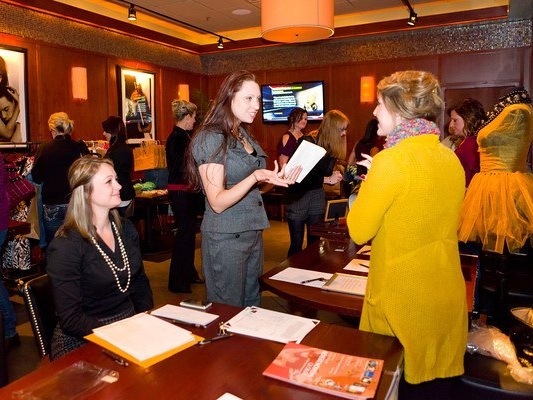 Executive Director, Meredith Looney, arrives at the Your girl Friend’s closet event to collect the donations and funds provided by this event held at bar louie in Little Rock, Arkansas.