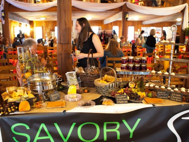 Bridal Savoir Faire vendor booth, Savory Catering, at the event hosted at Cypress Meadows.