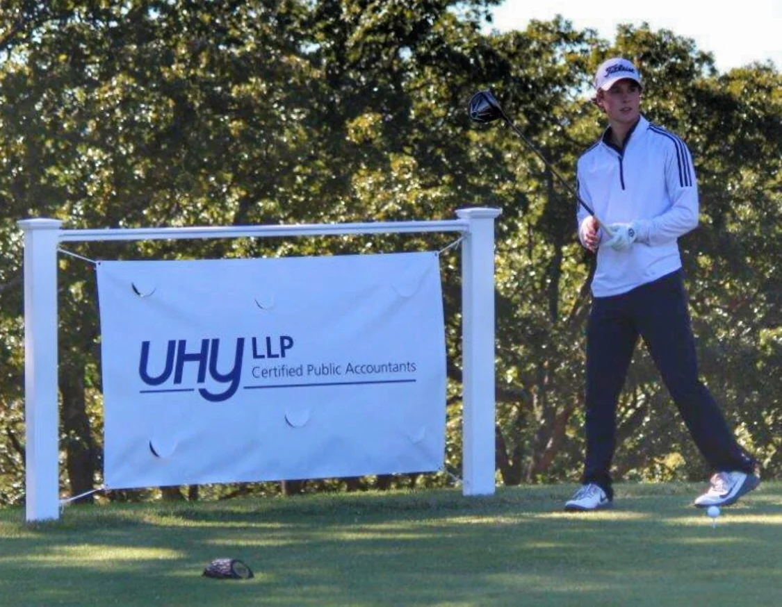 Z Shirley w UHY banner.jpeg